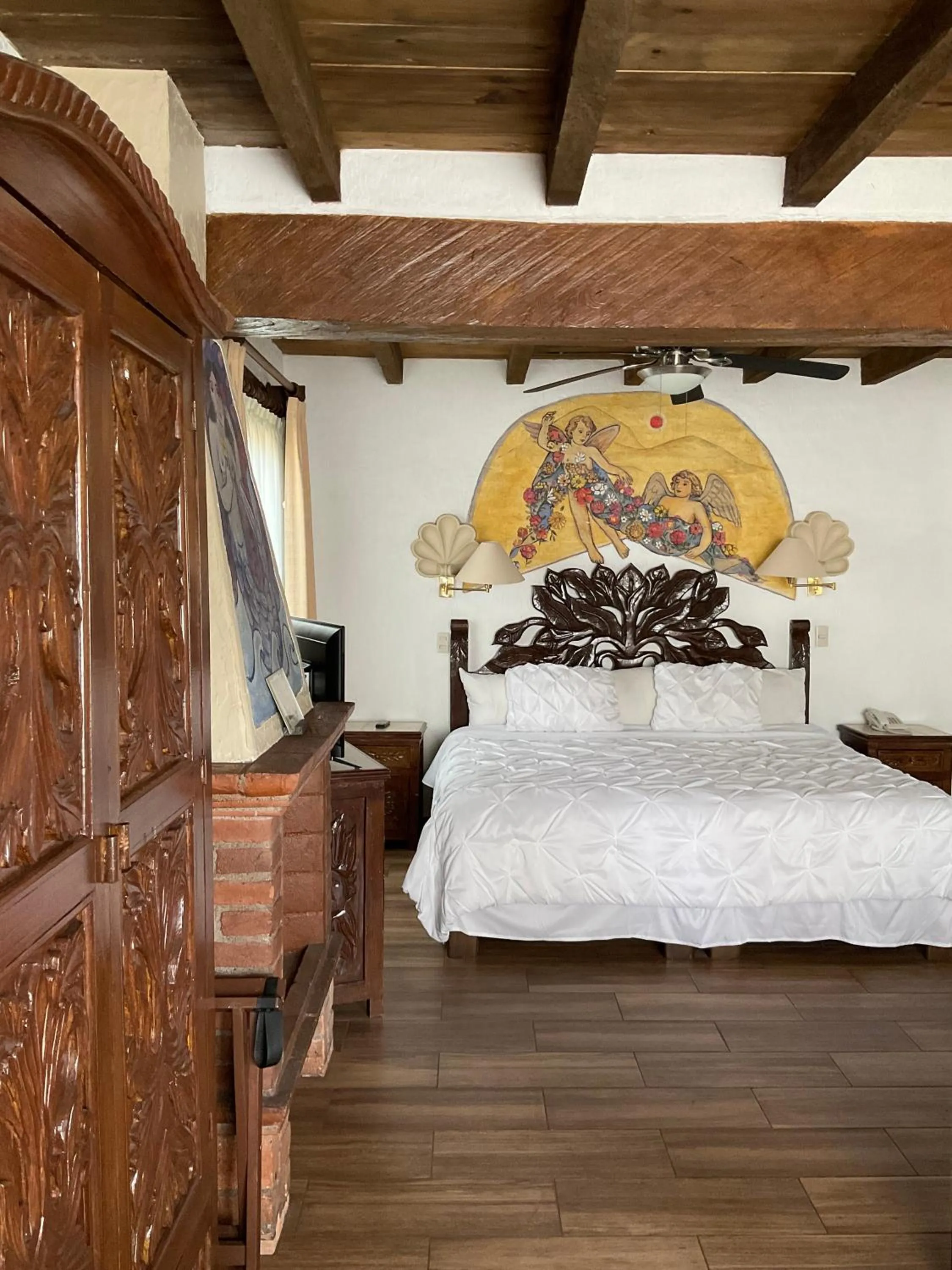 Bed in Villa San Jose Hotel & Suites