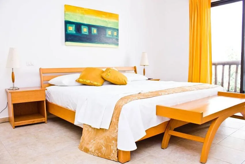 Bed in Villas Mayaluum Cozumel