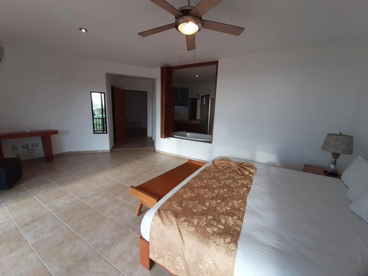 Bed in Villas Mayaluum Cozumel