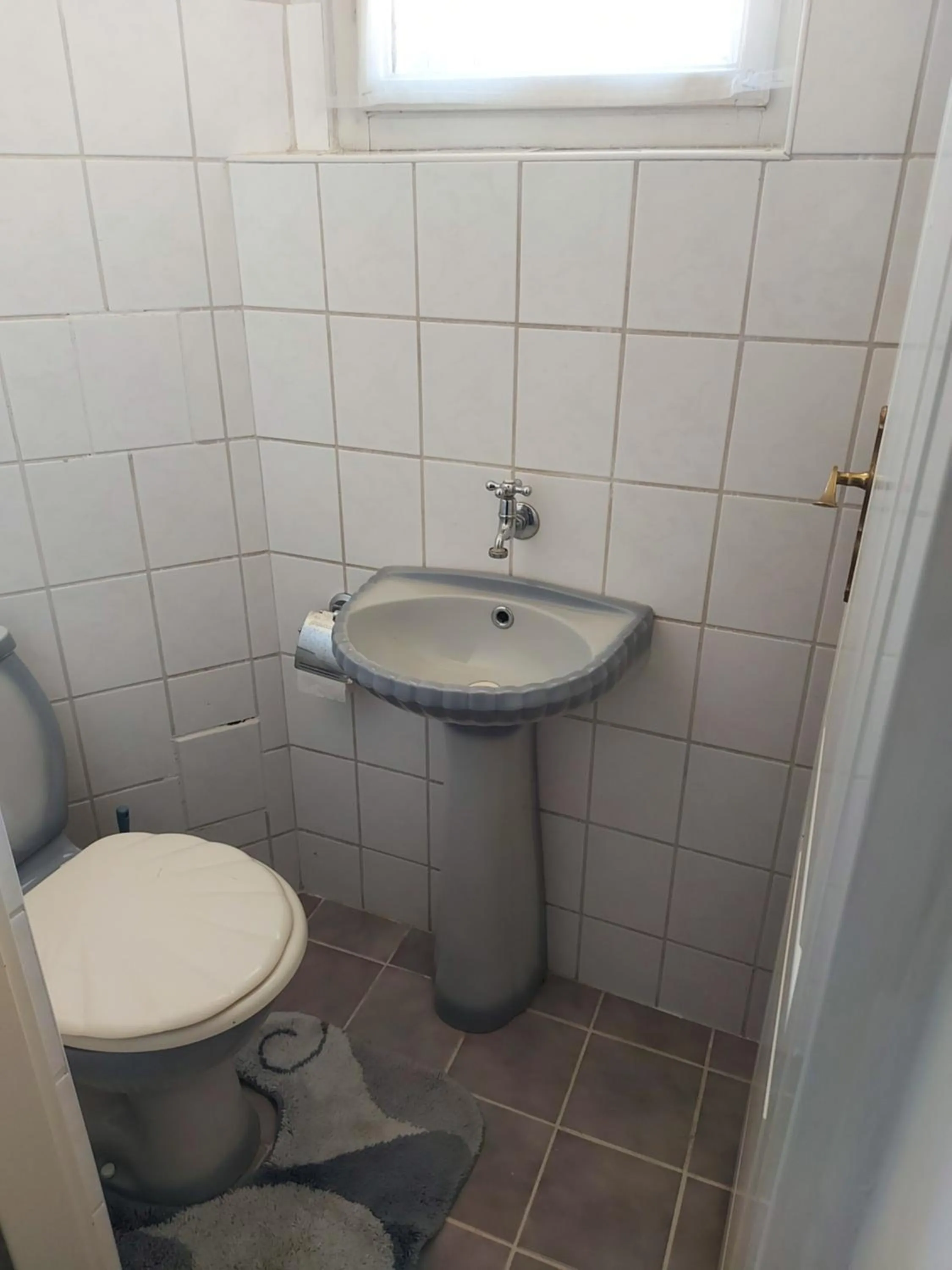 Toilet in Hotel Garni