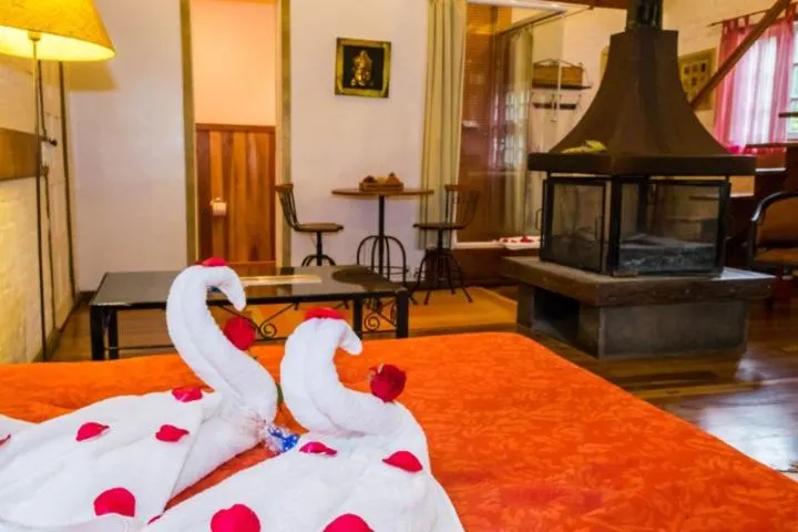 Bed in Pousada Solar D'Araucaria