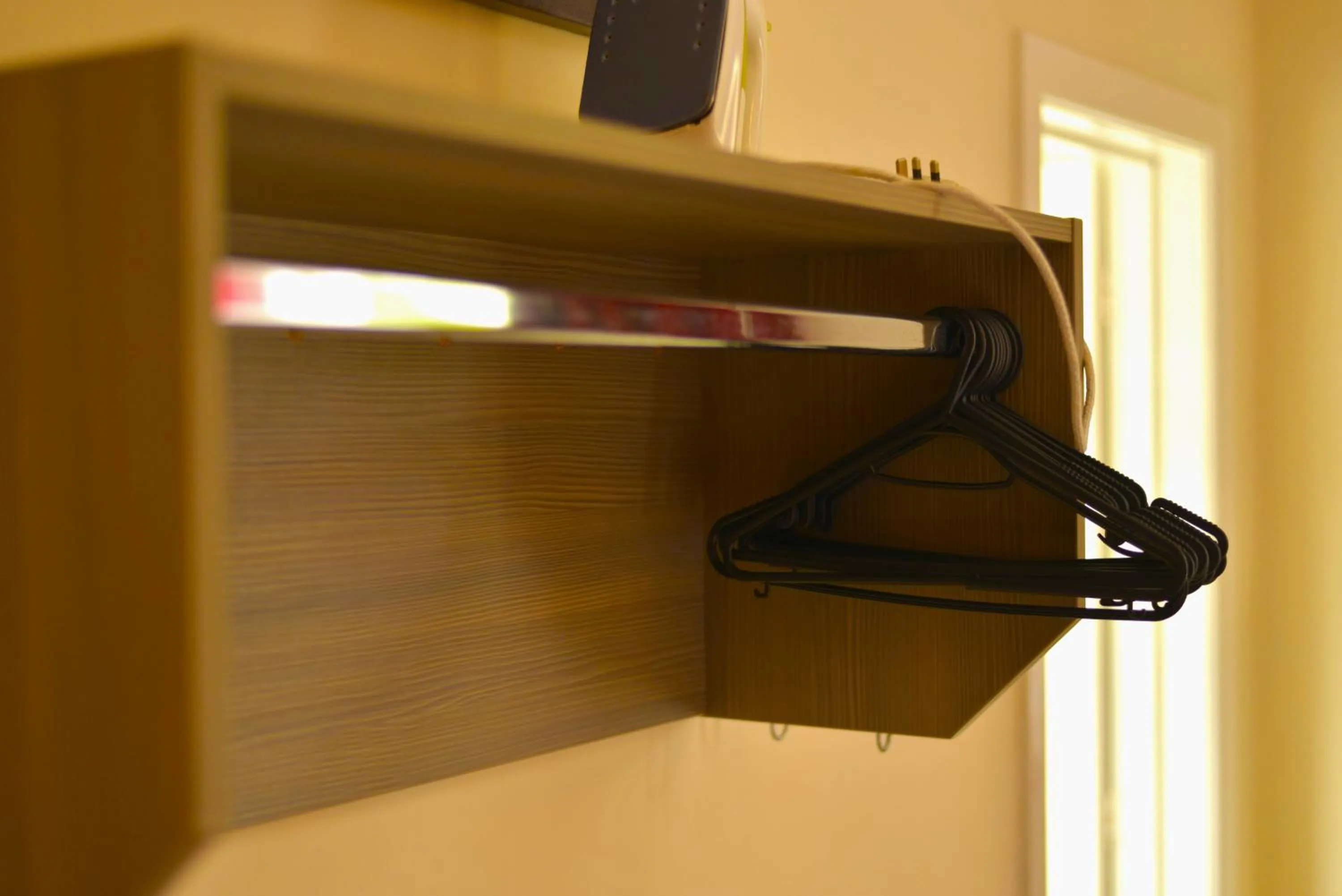 furniture, TV/Entertainment Center in Piccadilly Hotel