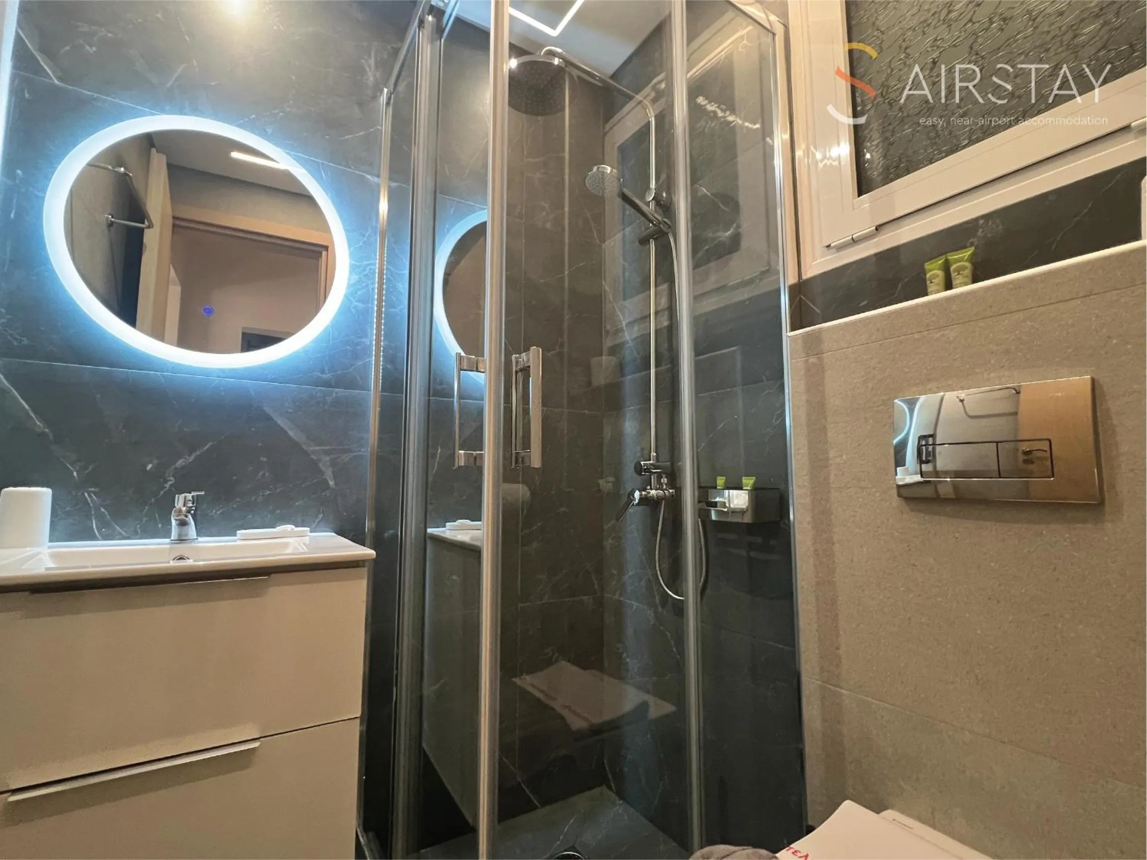 Bathroom in Nautilus Apartments Airport by Airstay