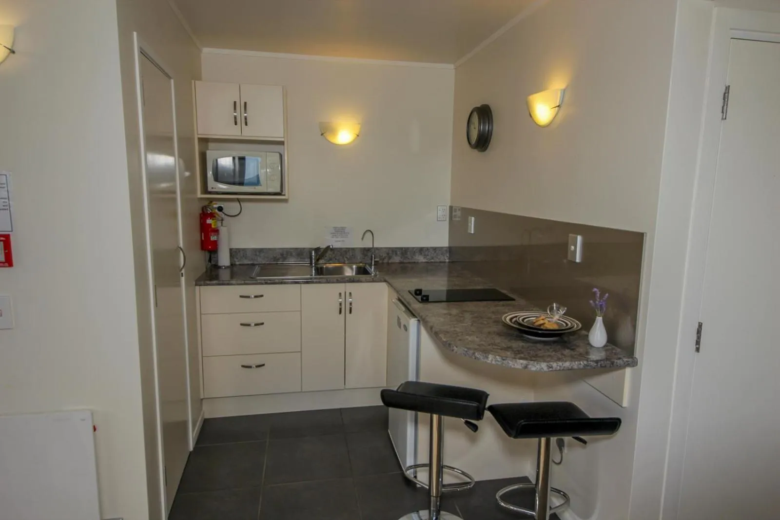 Kitchen or kitchenette in By the Bay Beachfront Apartments