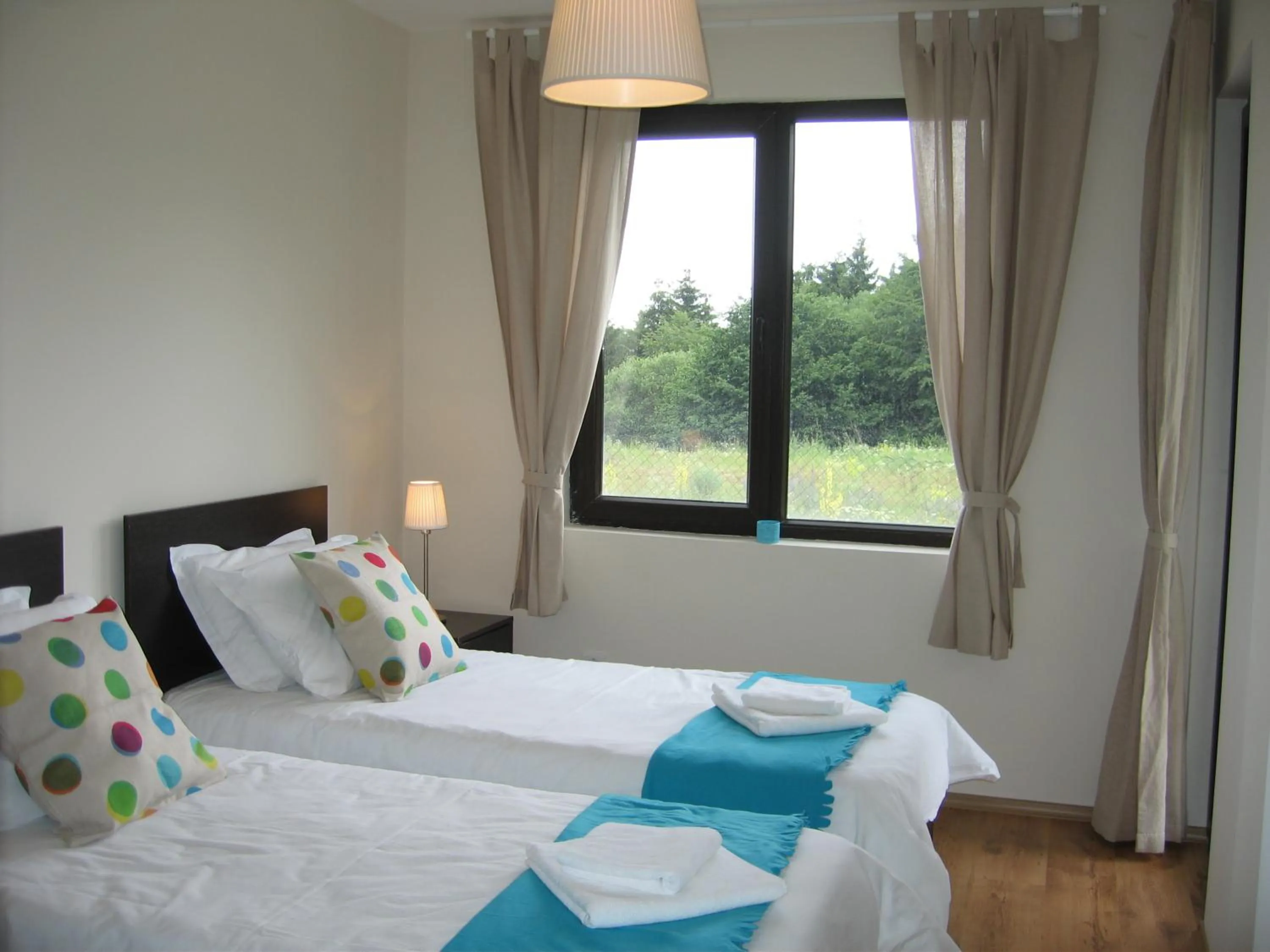 Bed in Chamkoria Chalets