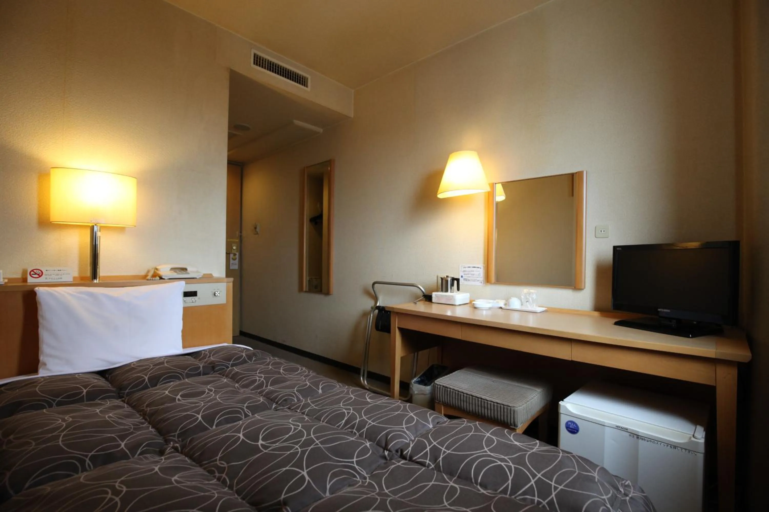 Photo of the whole room, Bed in AZ Inn Obu