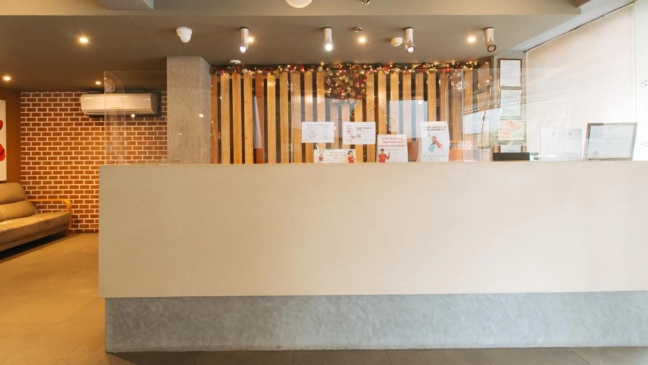 Lobby or reception in Guijo Suites Makati