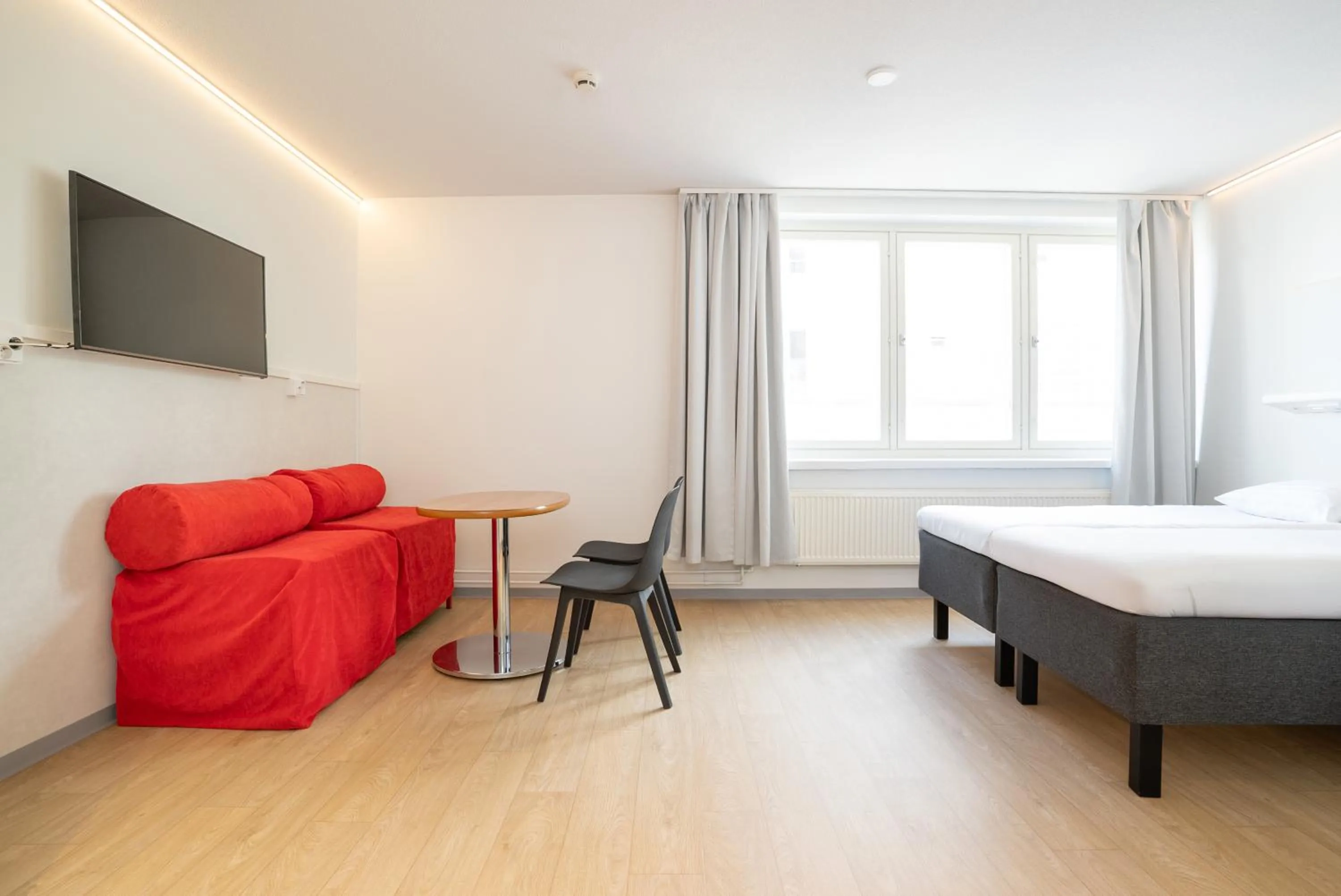 Bed in Omena Hotel Jyväskylä