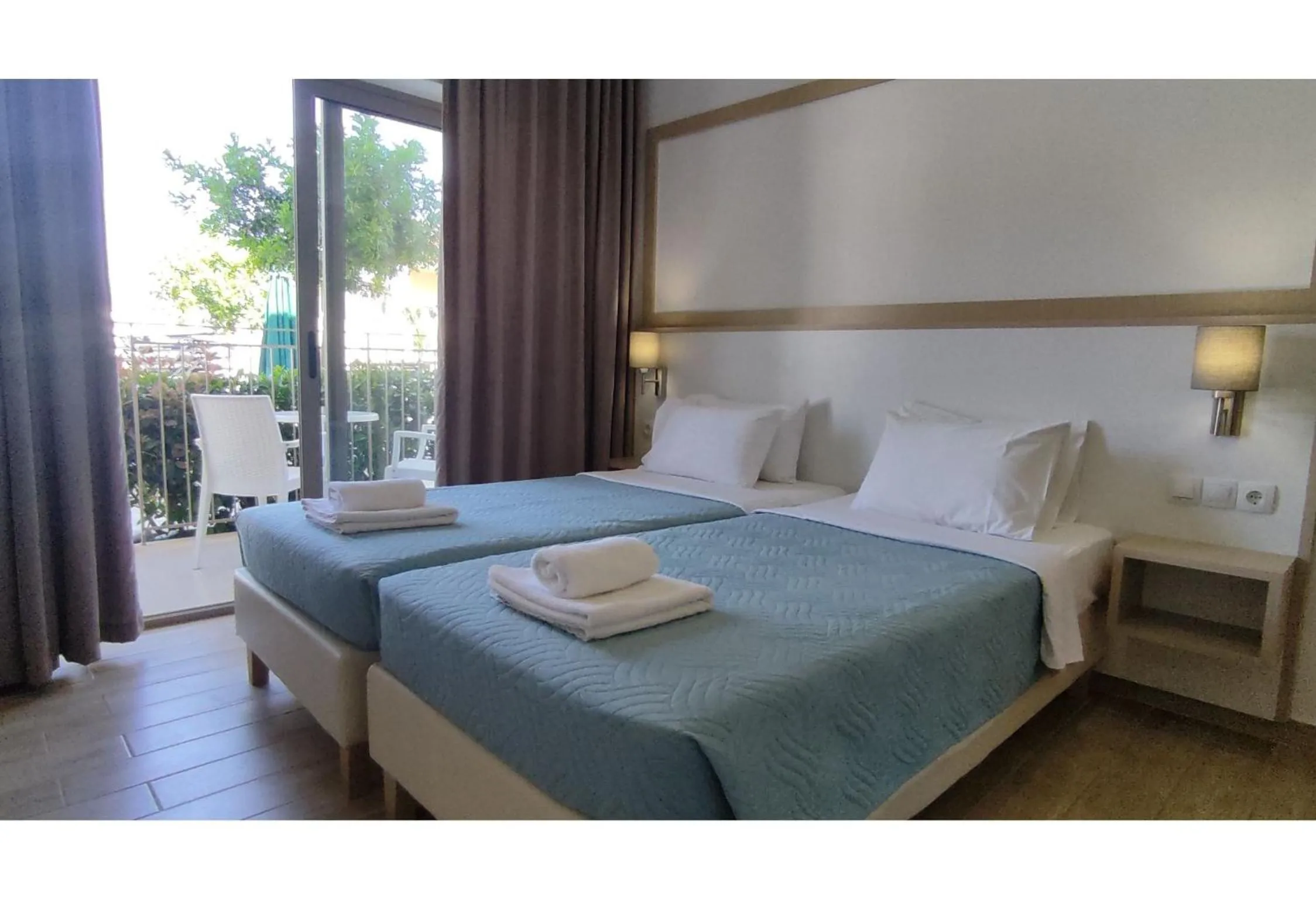 Photo of the whole room, Bed in Creta Verano Hotel