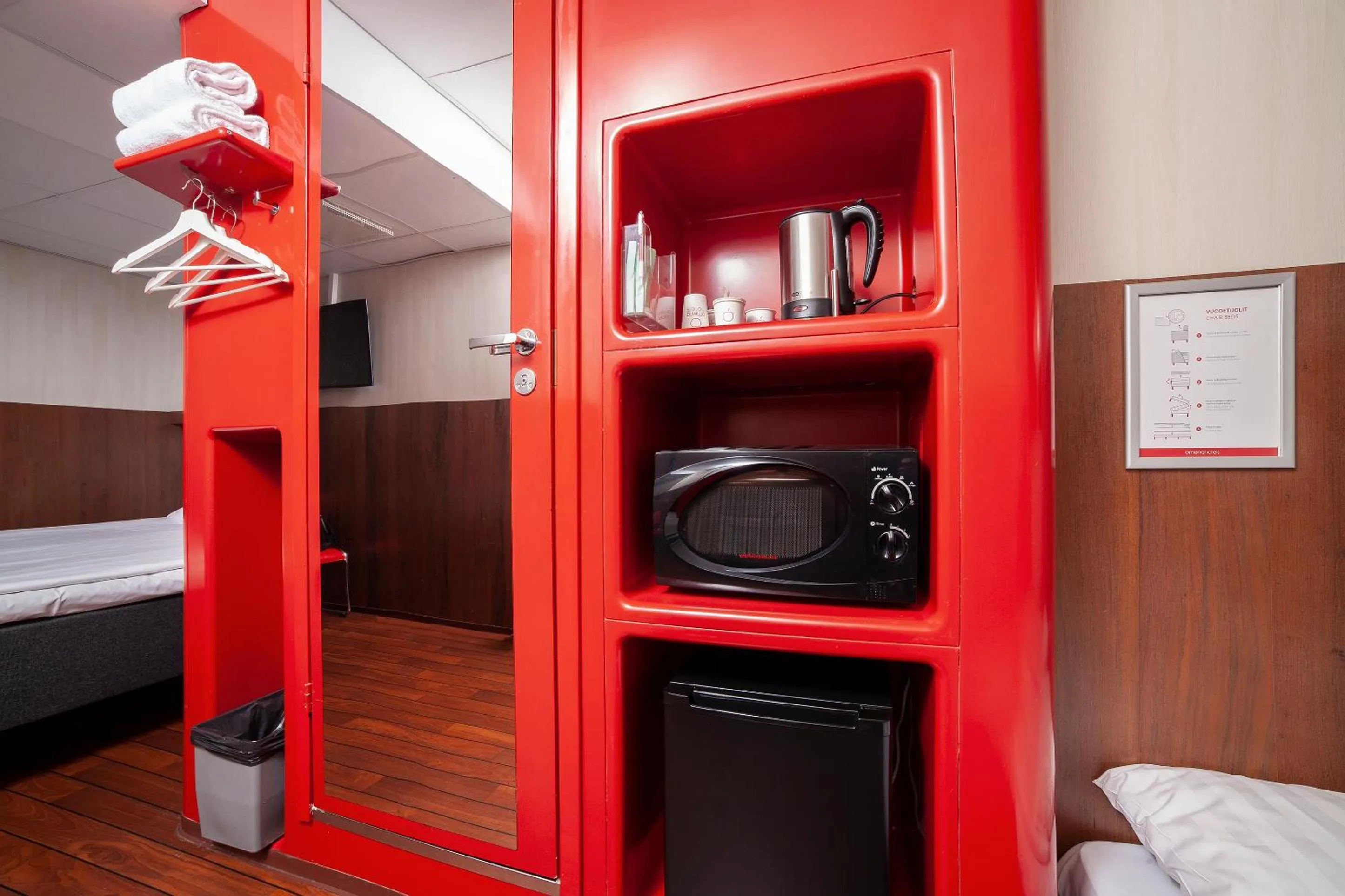 Kitchen or kitchenette, Bed in Omena Hotel Helsinki City Centre