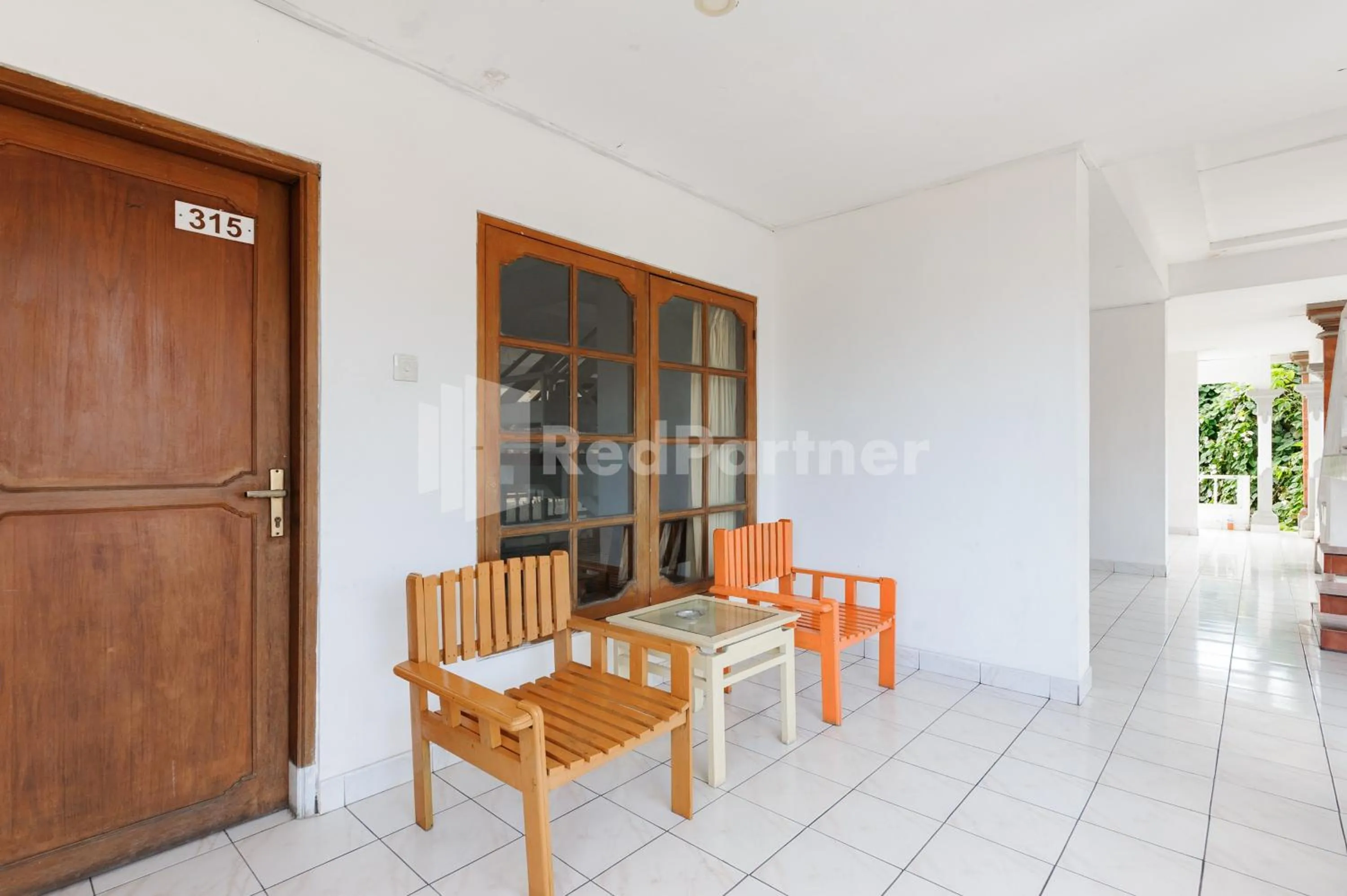 Seating area in Pulau Bali Hotel Denpasar RedPartner