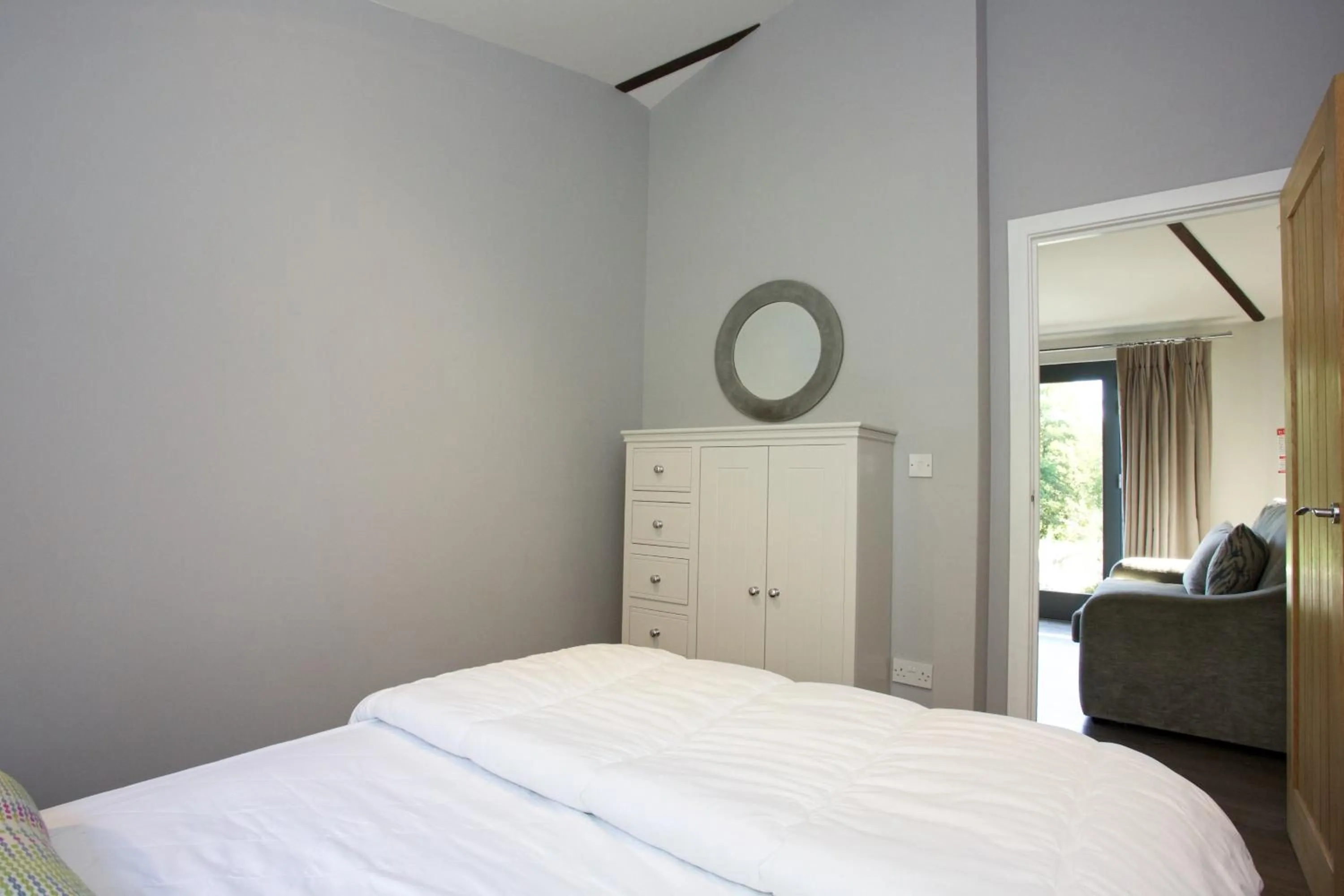 Bedroom, Bed in LOCH TAY HIGHLAND LODGES and GLAMPING PARK