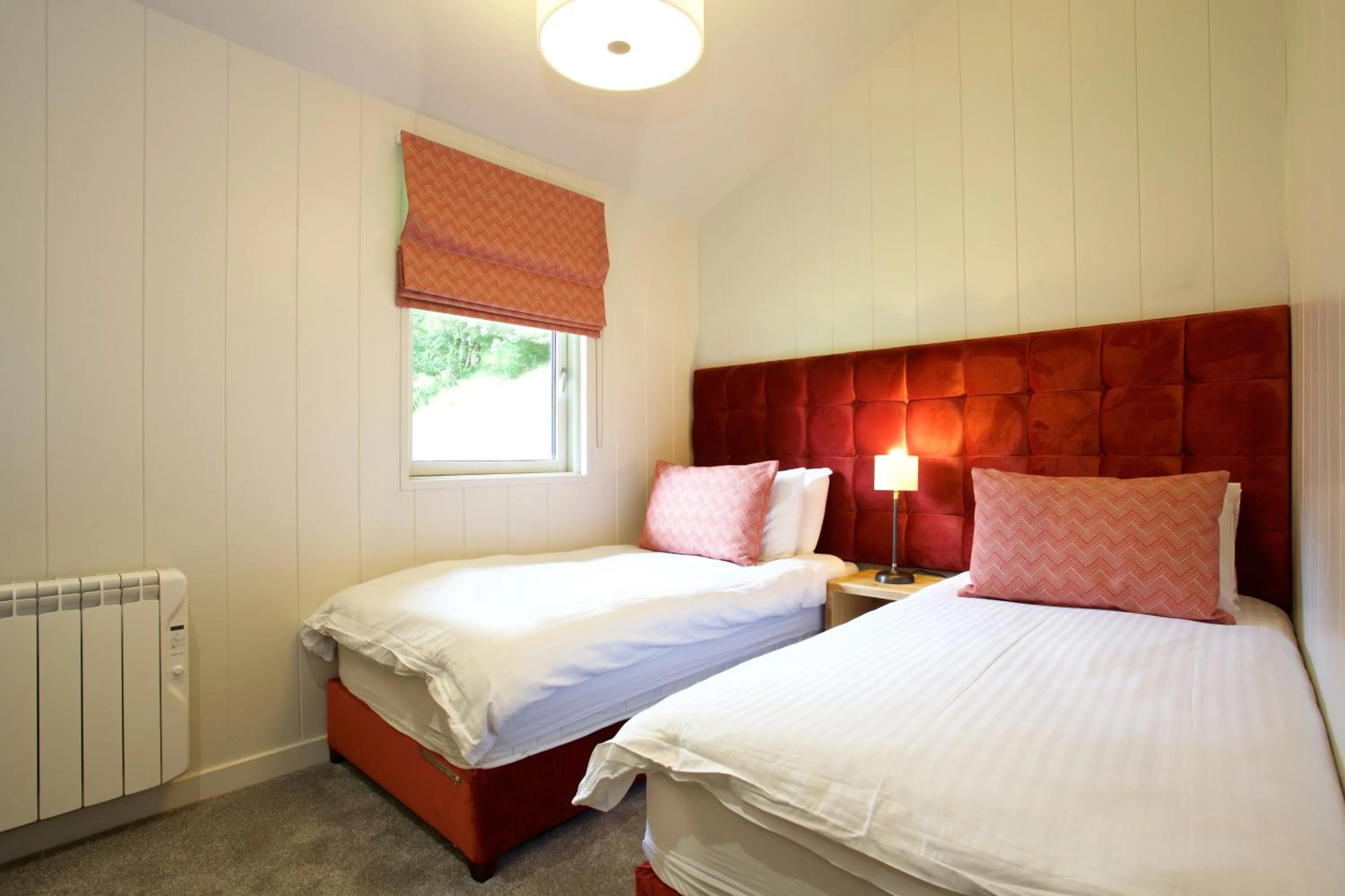 Bedroom, Bed in LOCH TAY HIGHLAND LODGES and GLAMPING PARK