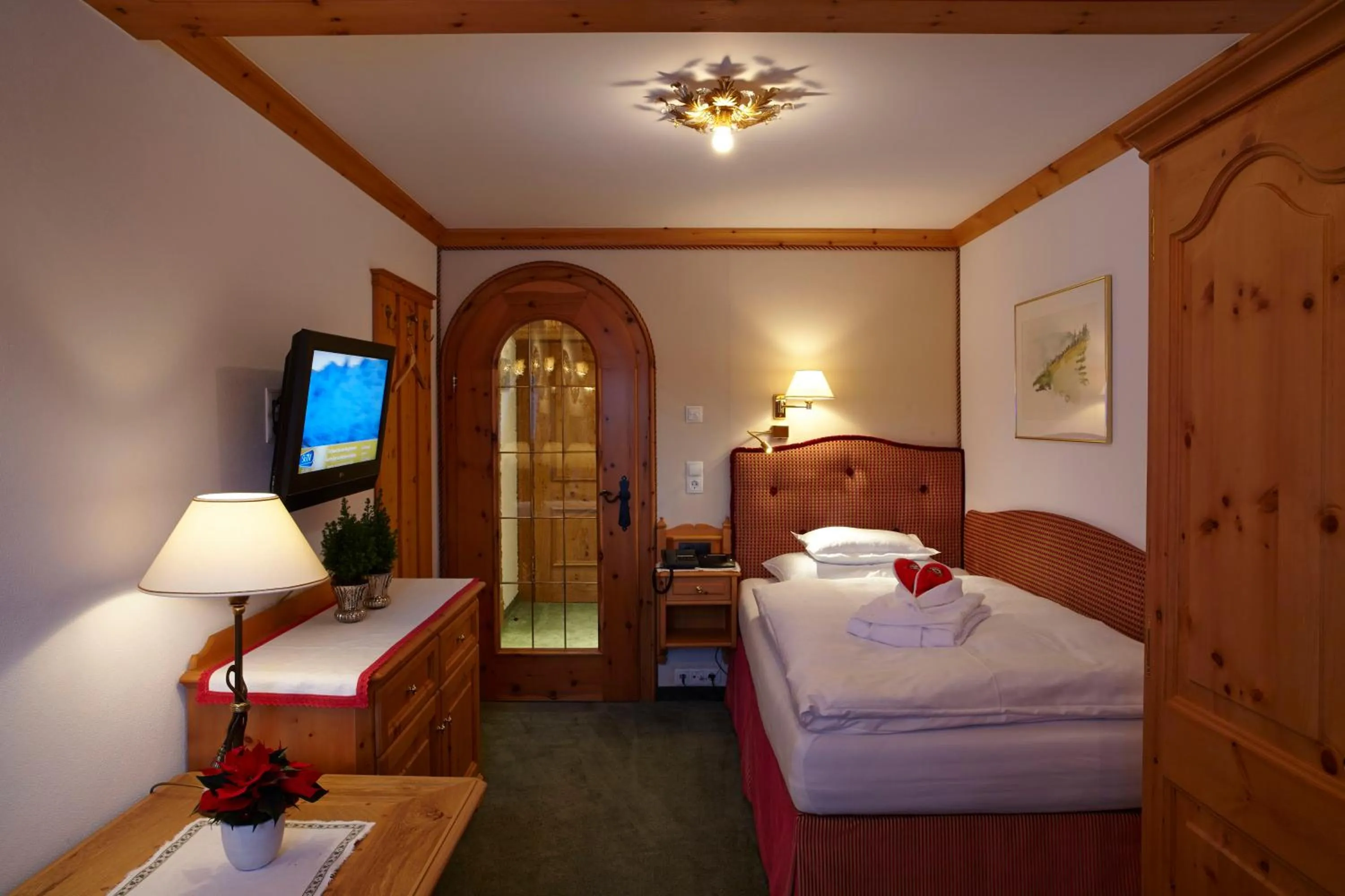 Bed in Sporthotel Lorünser