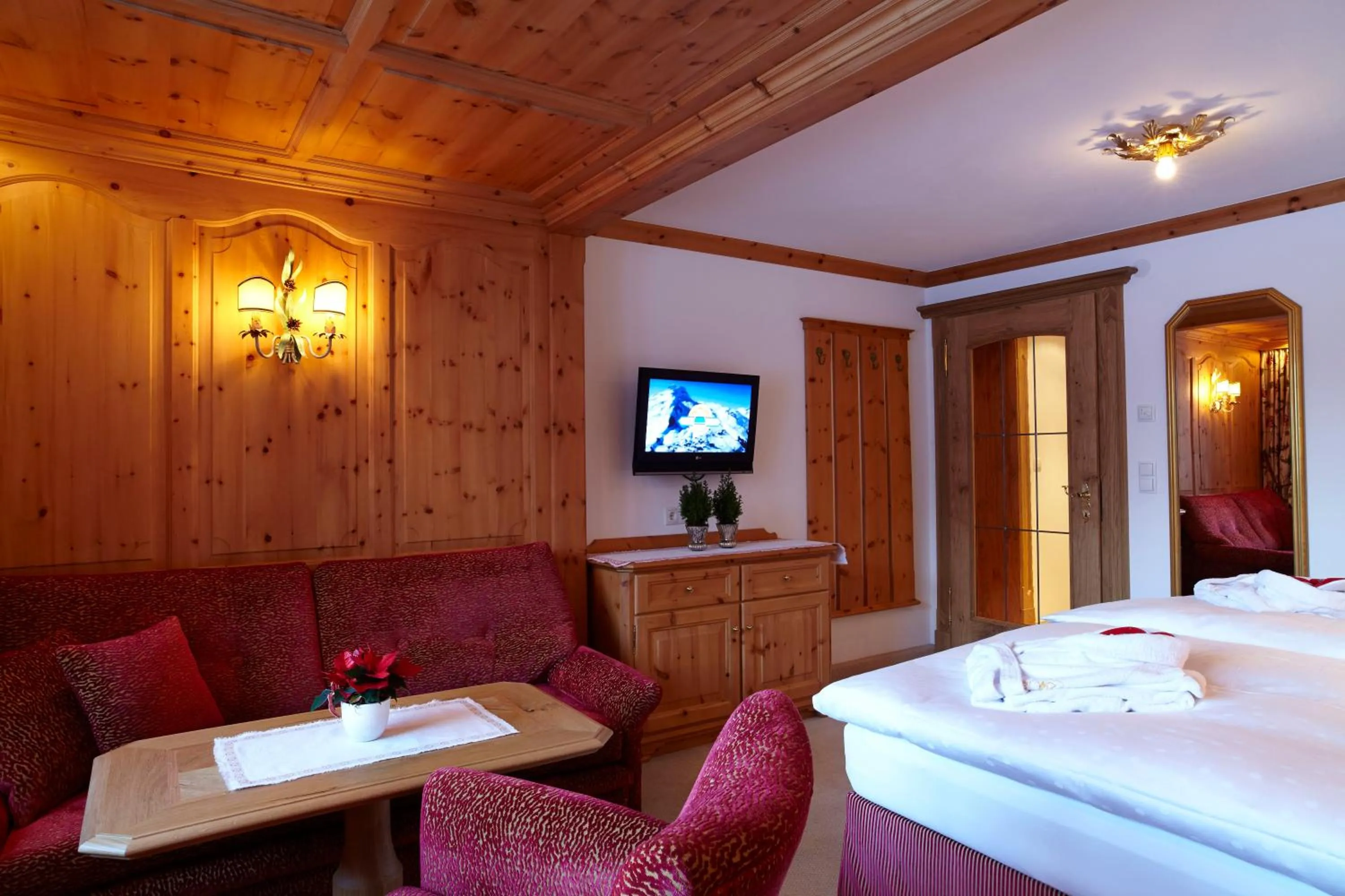 Photo of the whole room, Bed in Sporthotel Lorünser