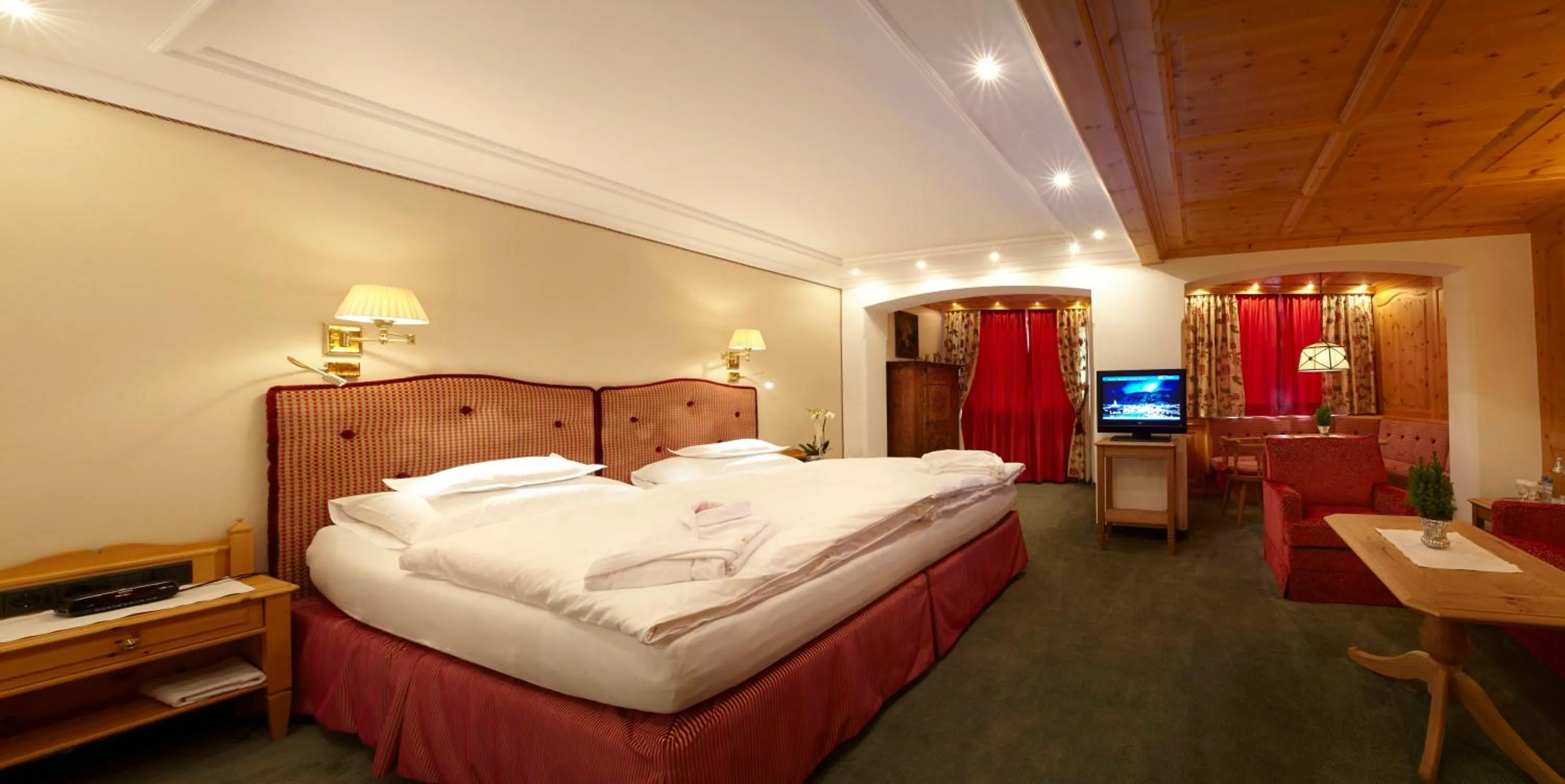 Photo of the whole room, Bed in Sporthotel Lorünser