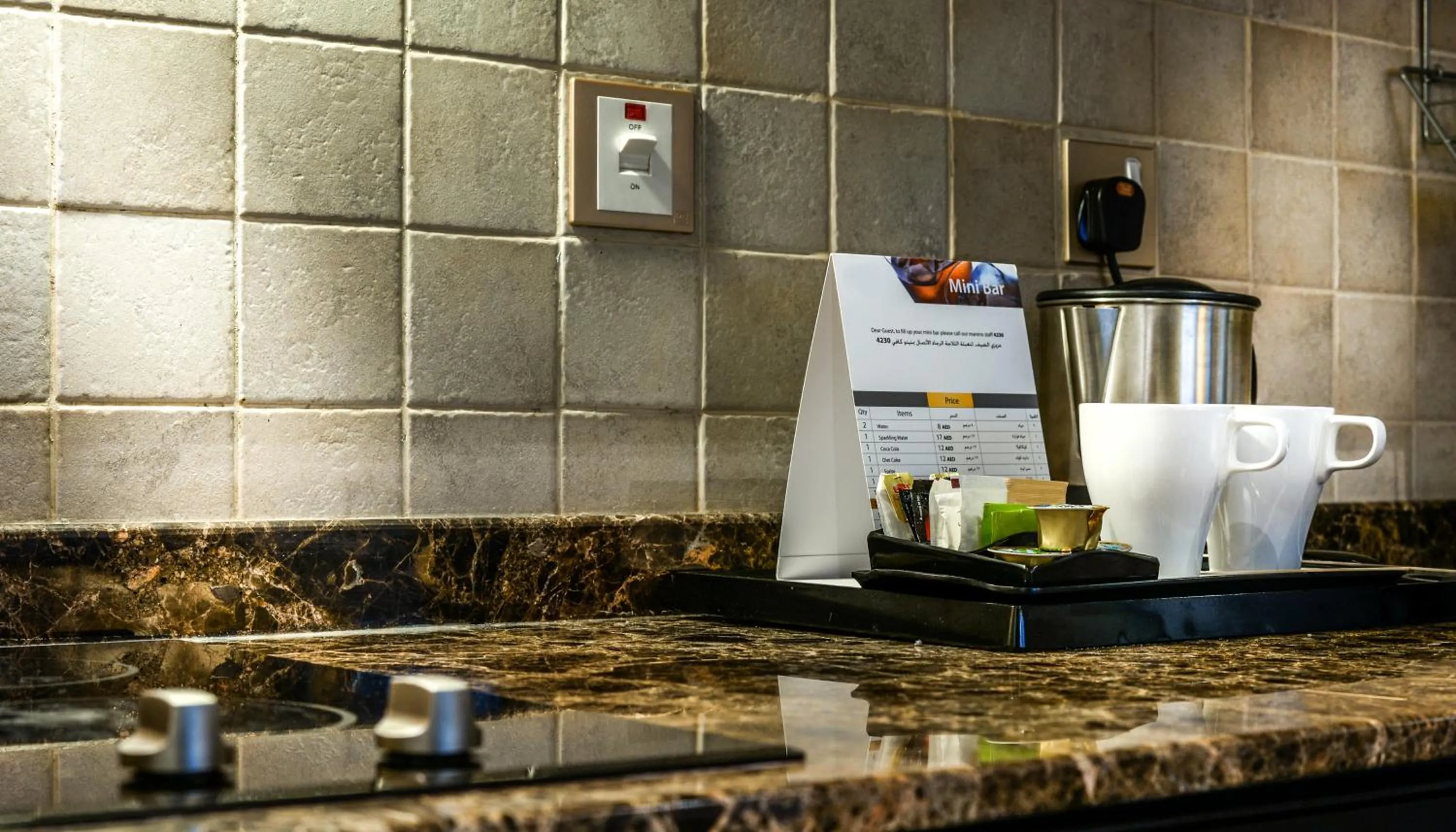 Coffee/tea facilities in First Central Hotel Suites