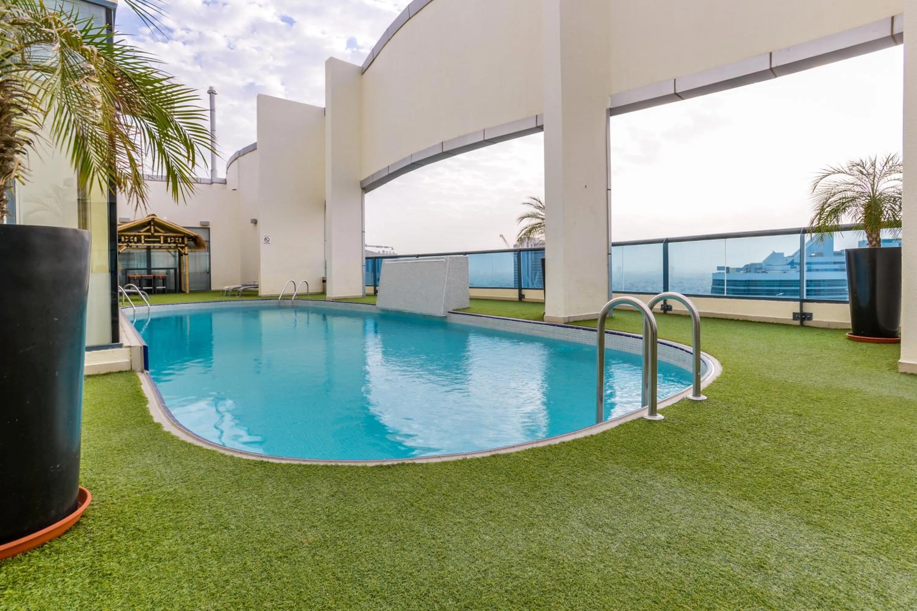 Swimming pool in First Central Hotel Suites