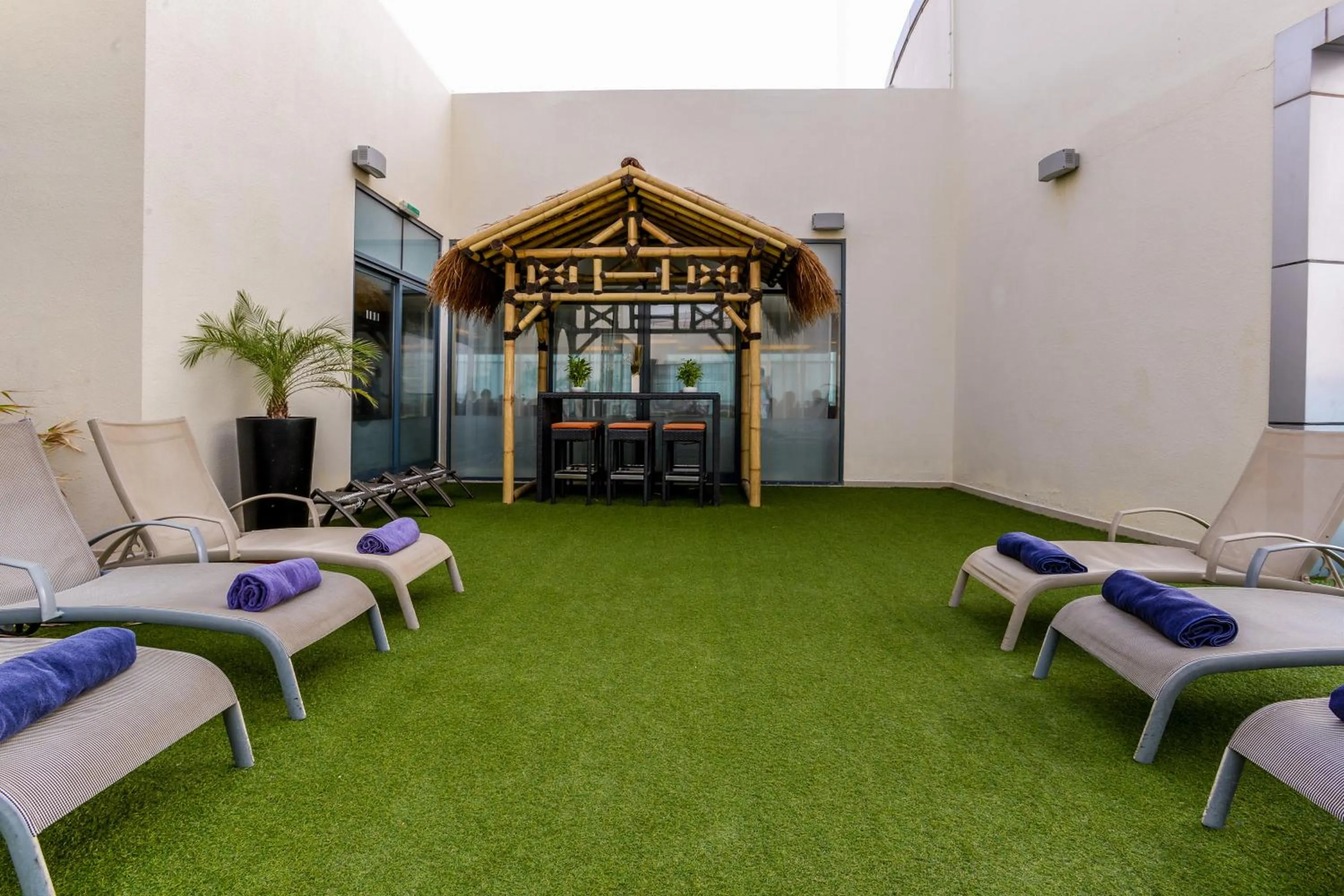 Swimming pool in First Central Hotel Suites