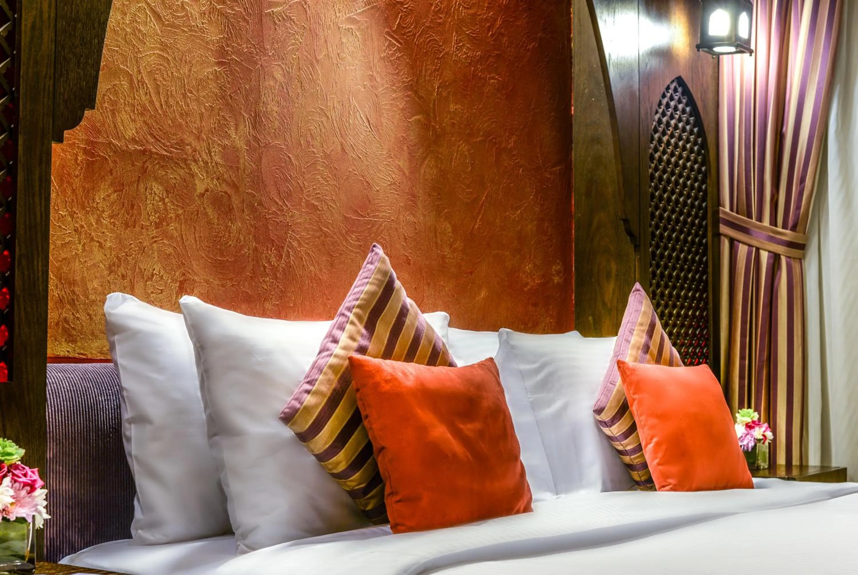 Bed in First Central Hotel Suites