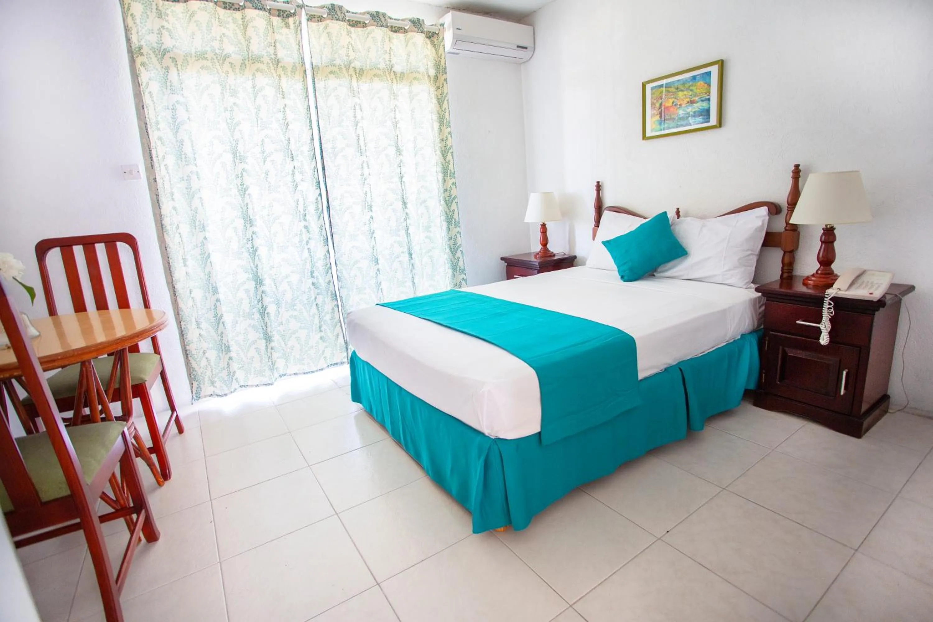 Patio, Bed in Adulo Apartments