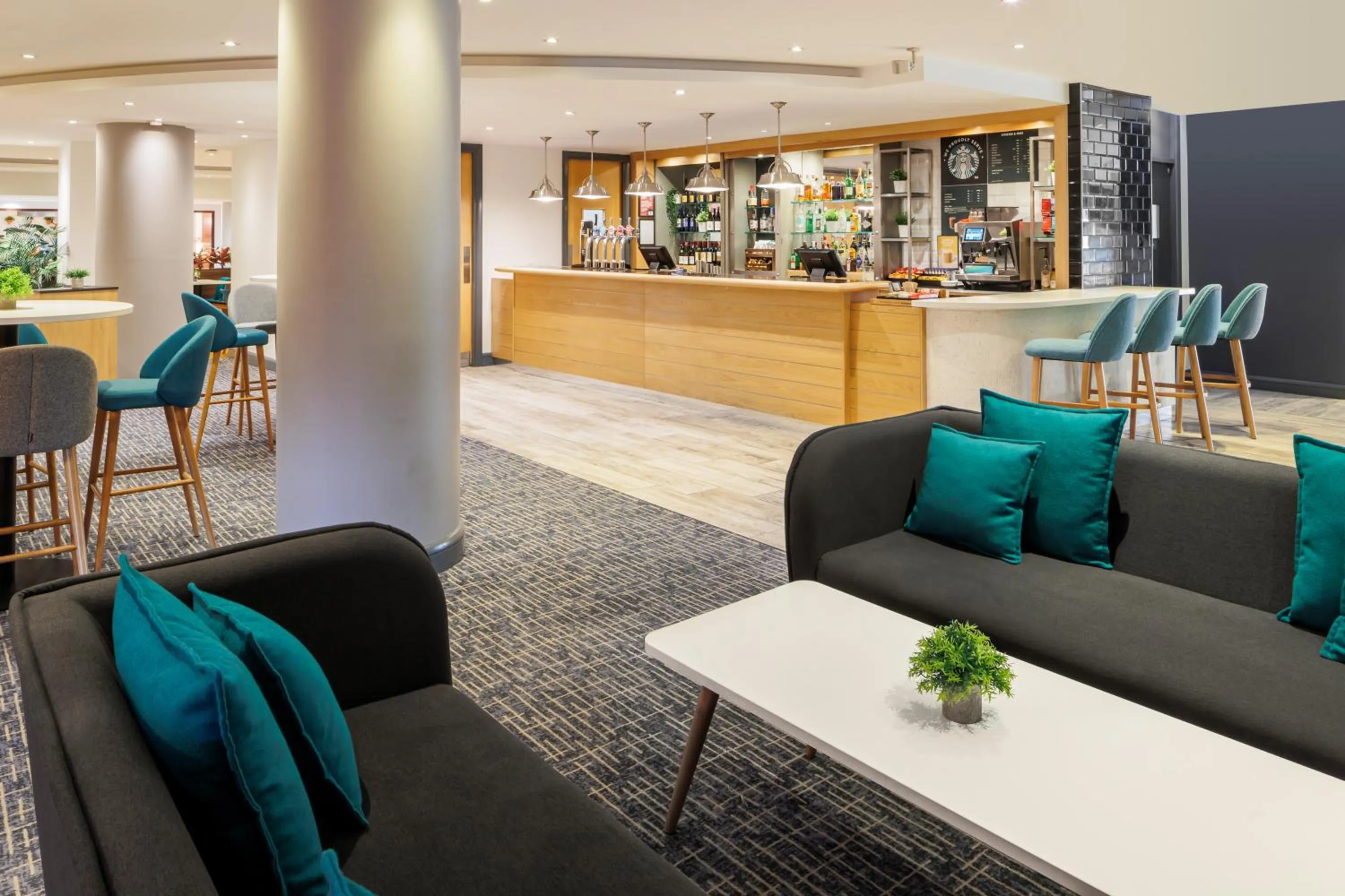 Communal lounge/ TV room in Holiday Inn High Wycombe M40, Jct.4 by IHG