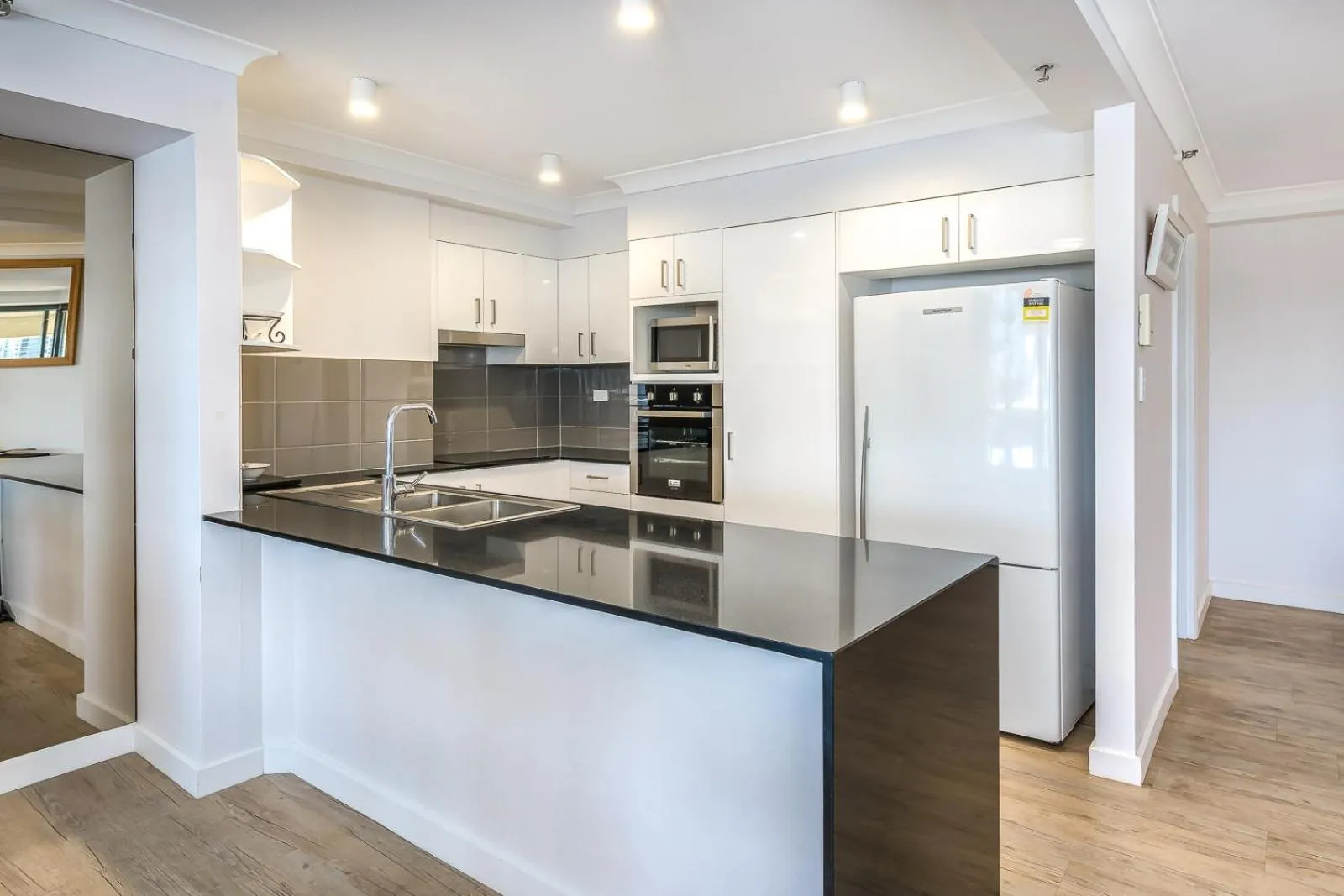 Kitchen or kitchenette in Victoria Square Apartments