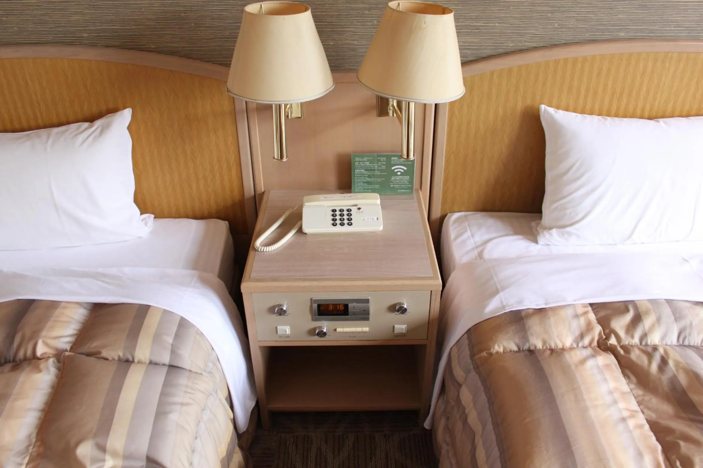 Bed in Rako Hananoi Hotel