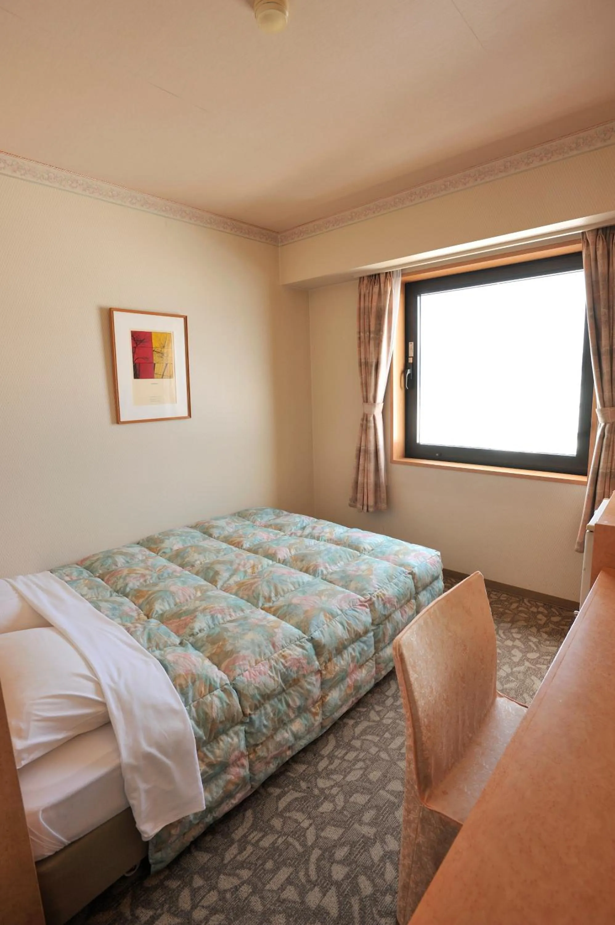 Bed in Rako Hananoi Hotel