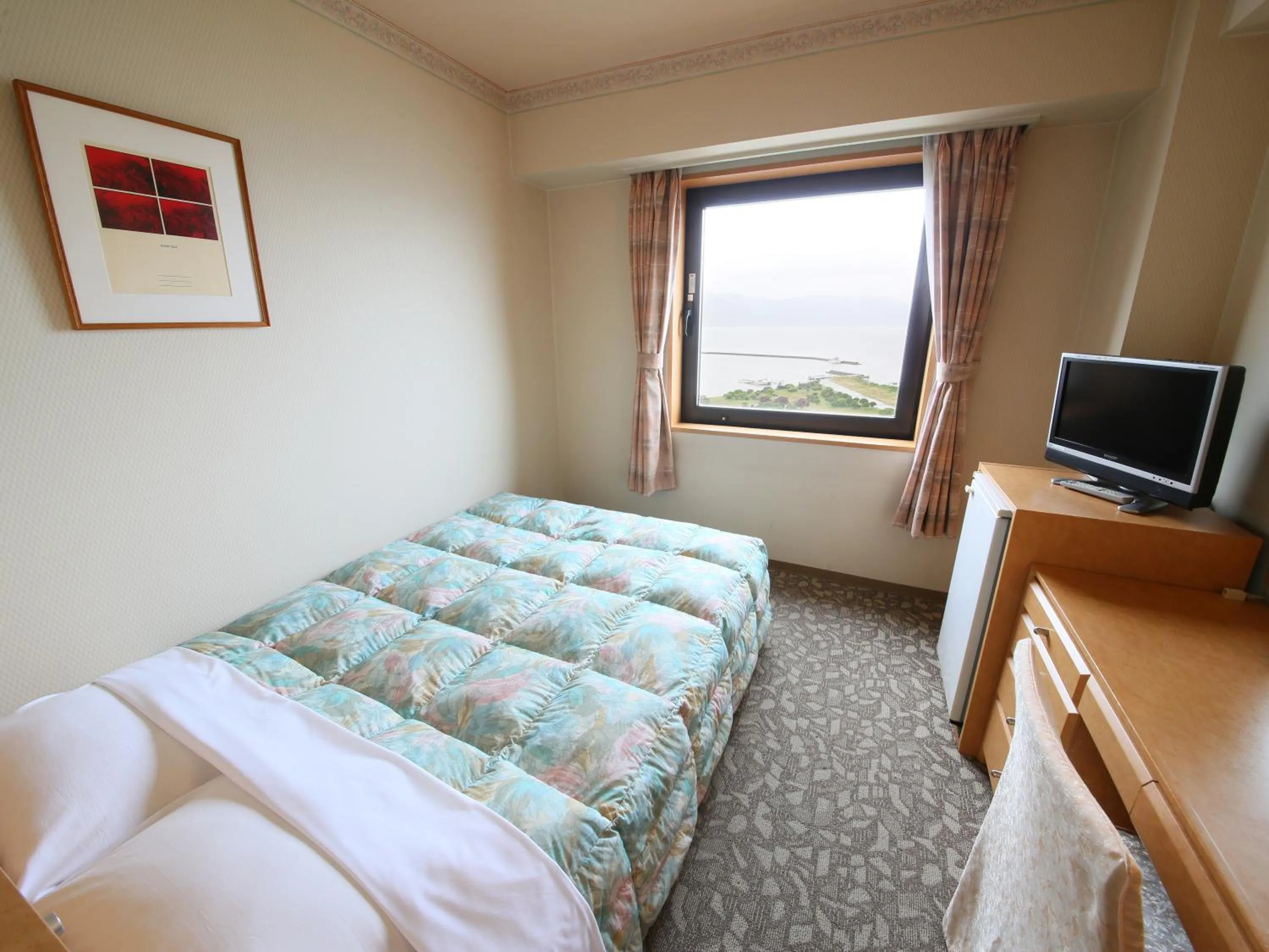 Photo of the whole room, Bed in Rako Hananoi Hotel