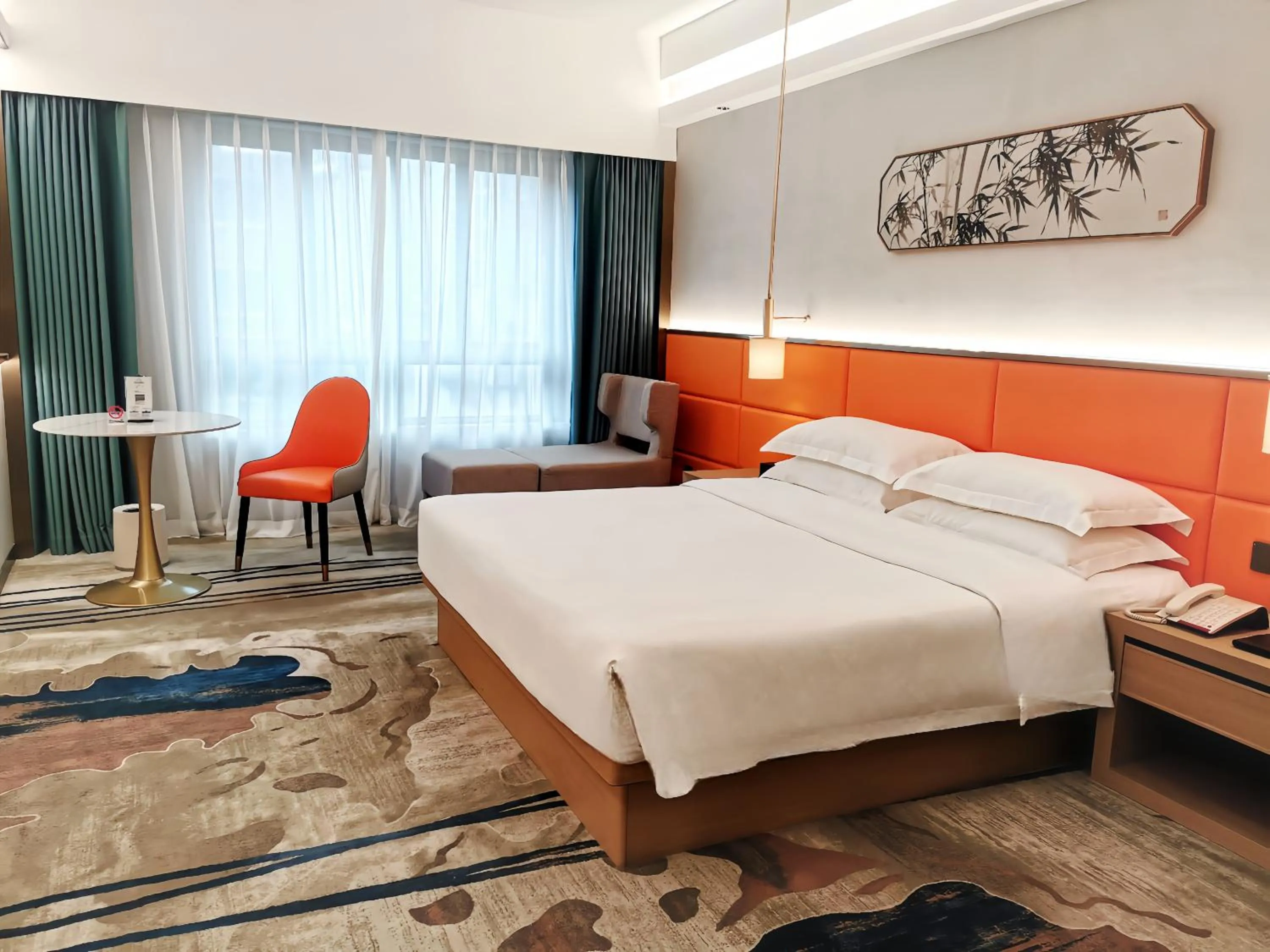 Bed in Landmark International Hotel