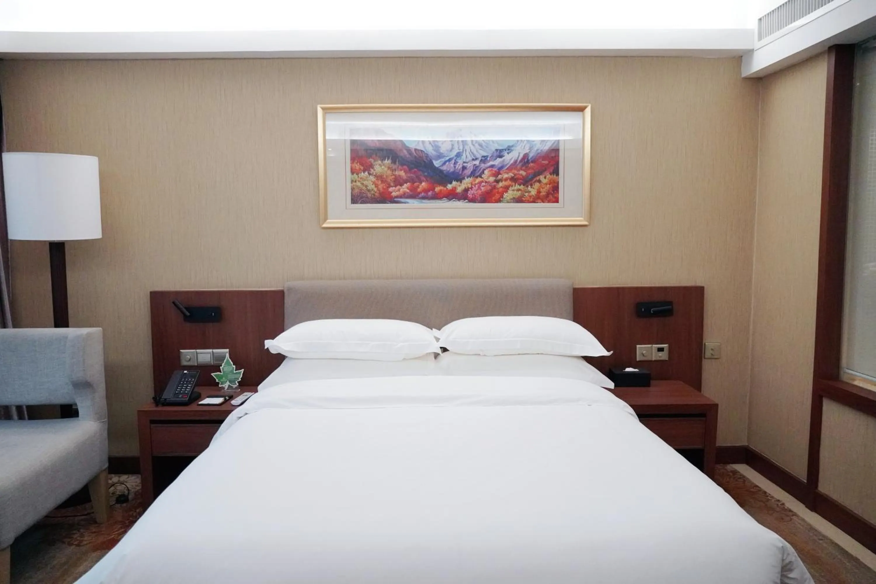 Bed in Landmark International Hotel
