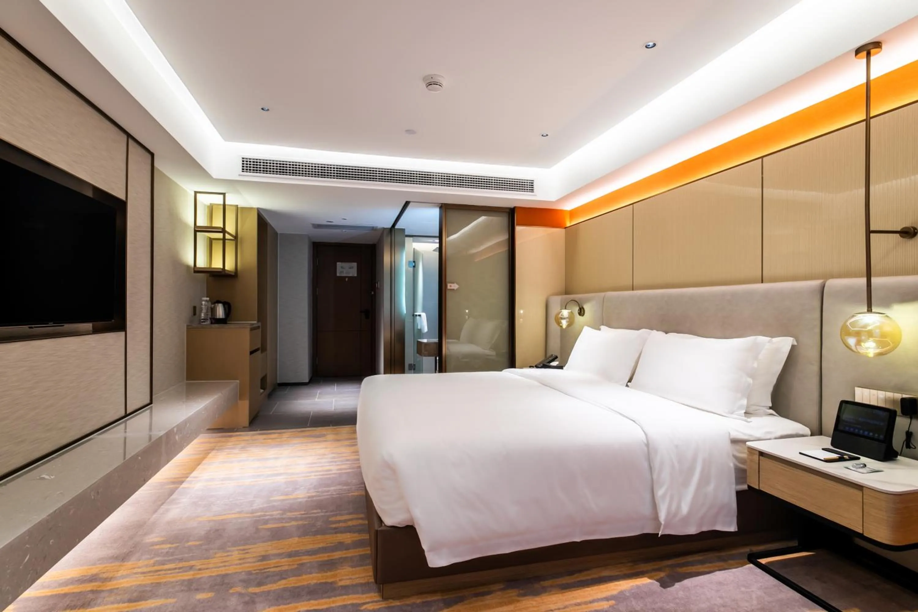 Bed in Landmark International Hotel
