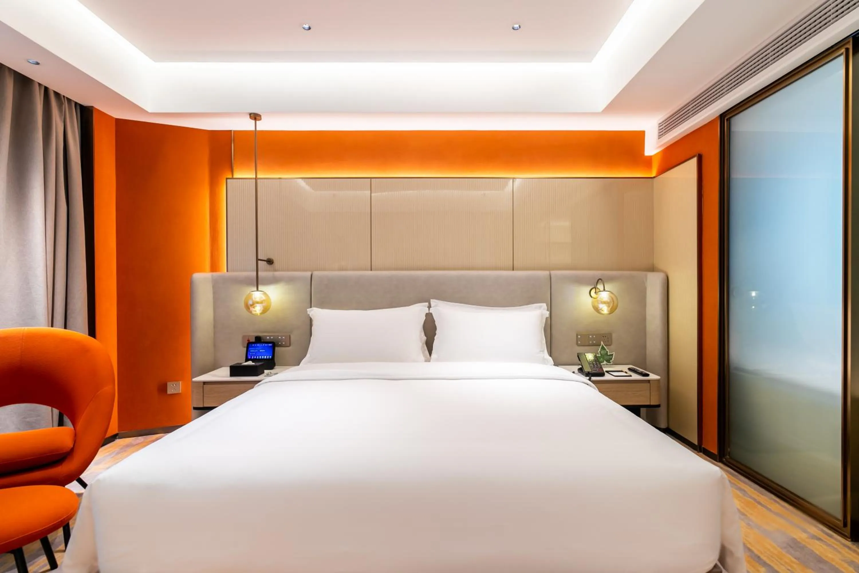 Bed in Landmark International Hotel
