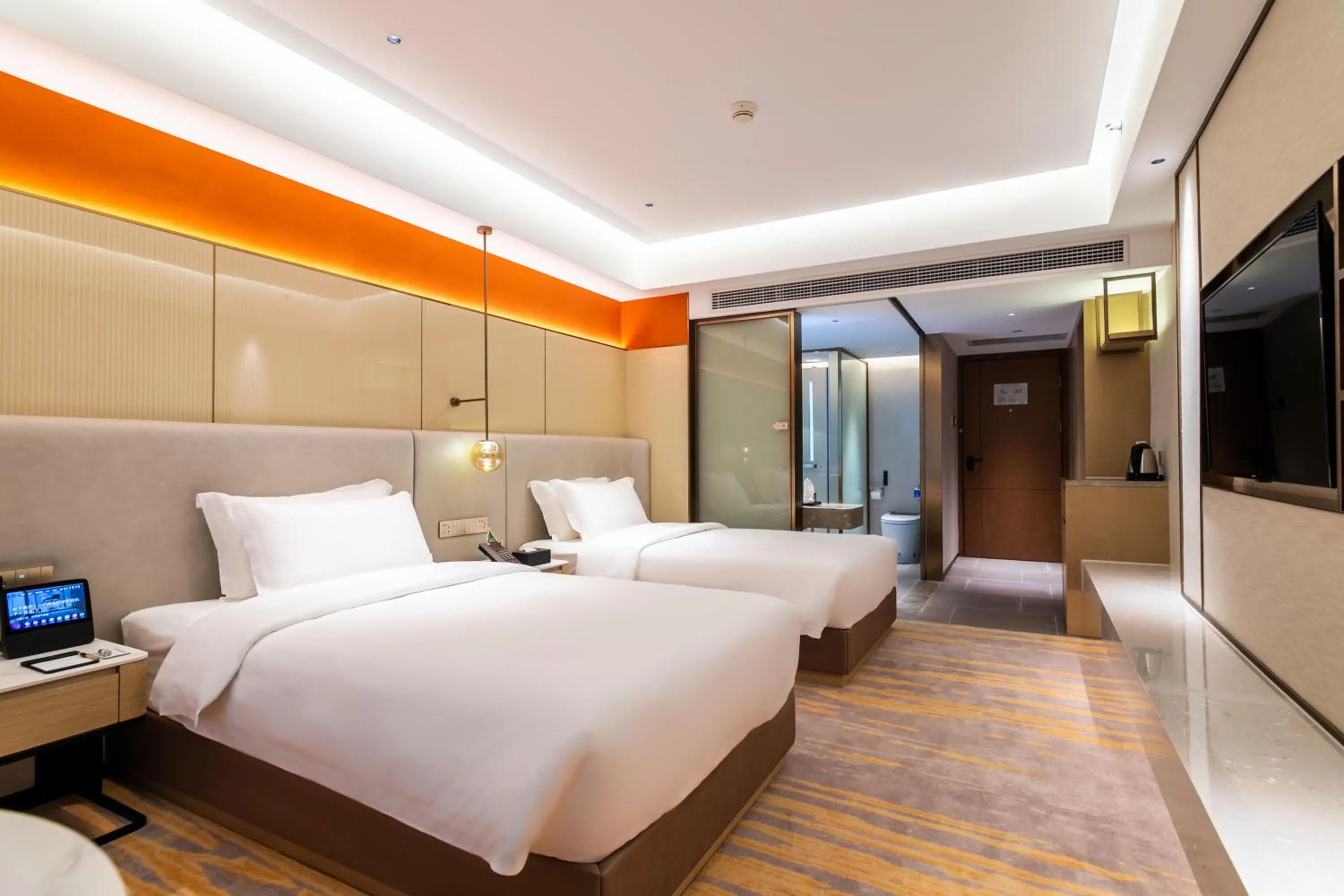 Bed in Landmark International Hotel