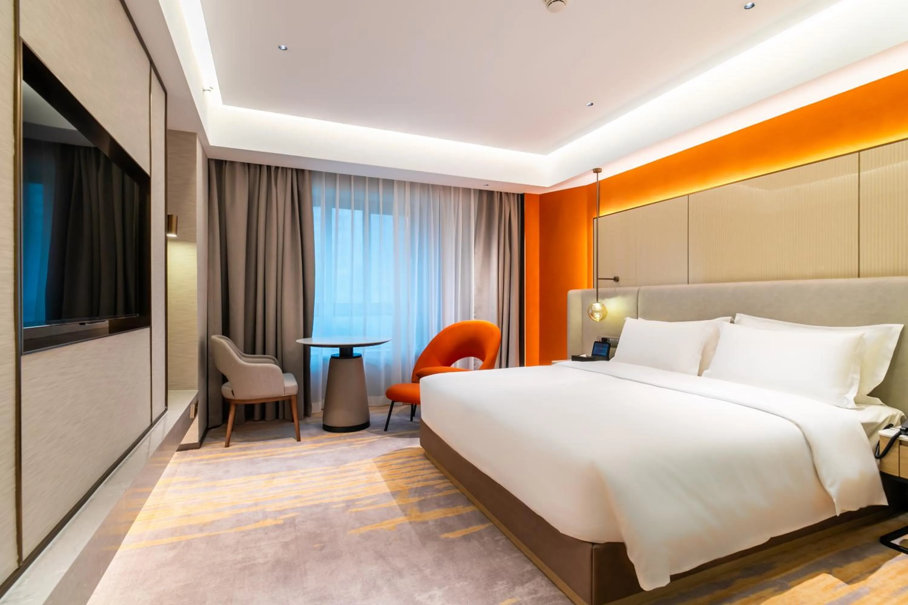 Bed in Landmark International Hotel