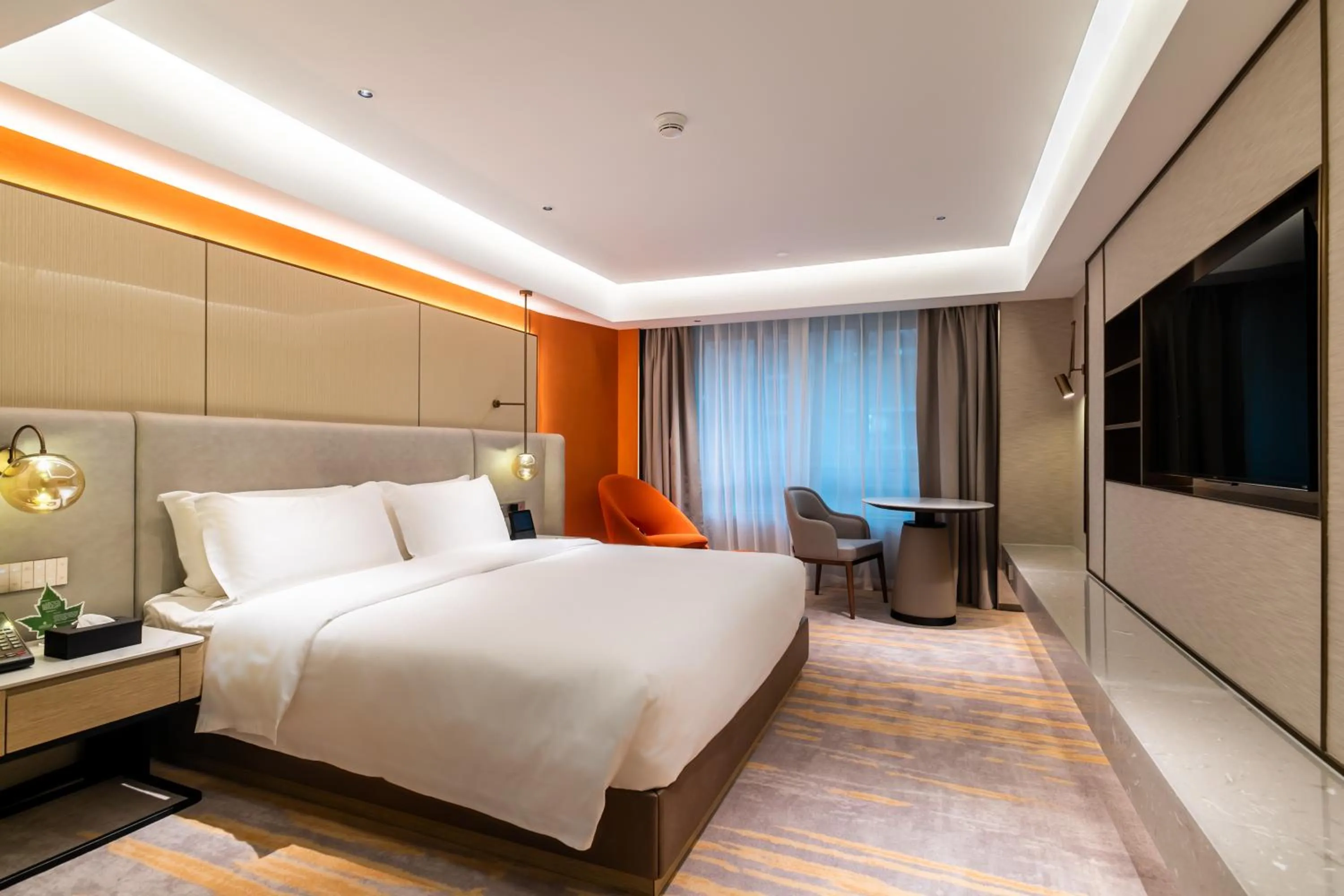 Bed in Landmark International Hotel