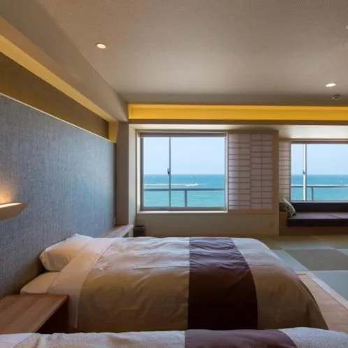 Bed in Kaike Grand Hotel Tensui