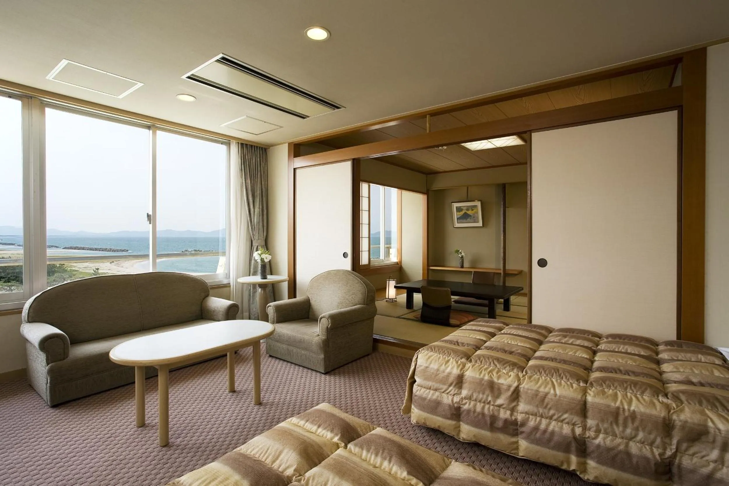 Photo of the whole room, Bed in Kaike Grand Hotel Tensui