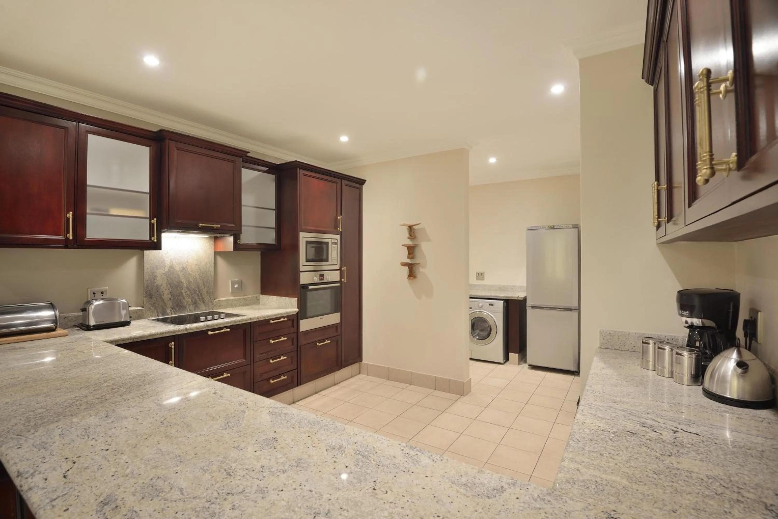 Kitchen or kitchenette in The Michelangelo Towers