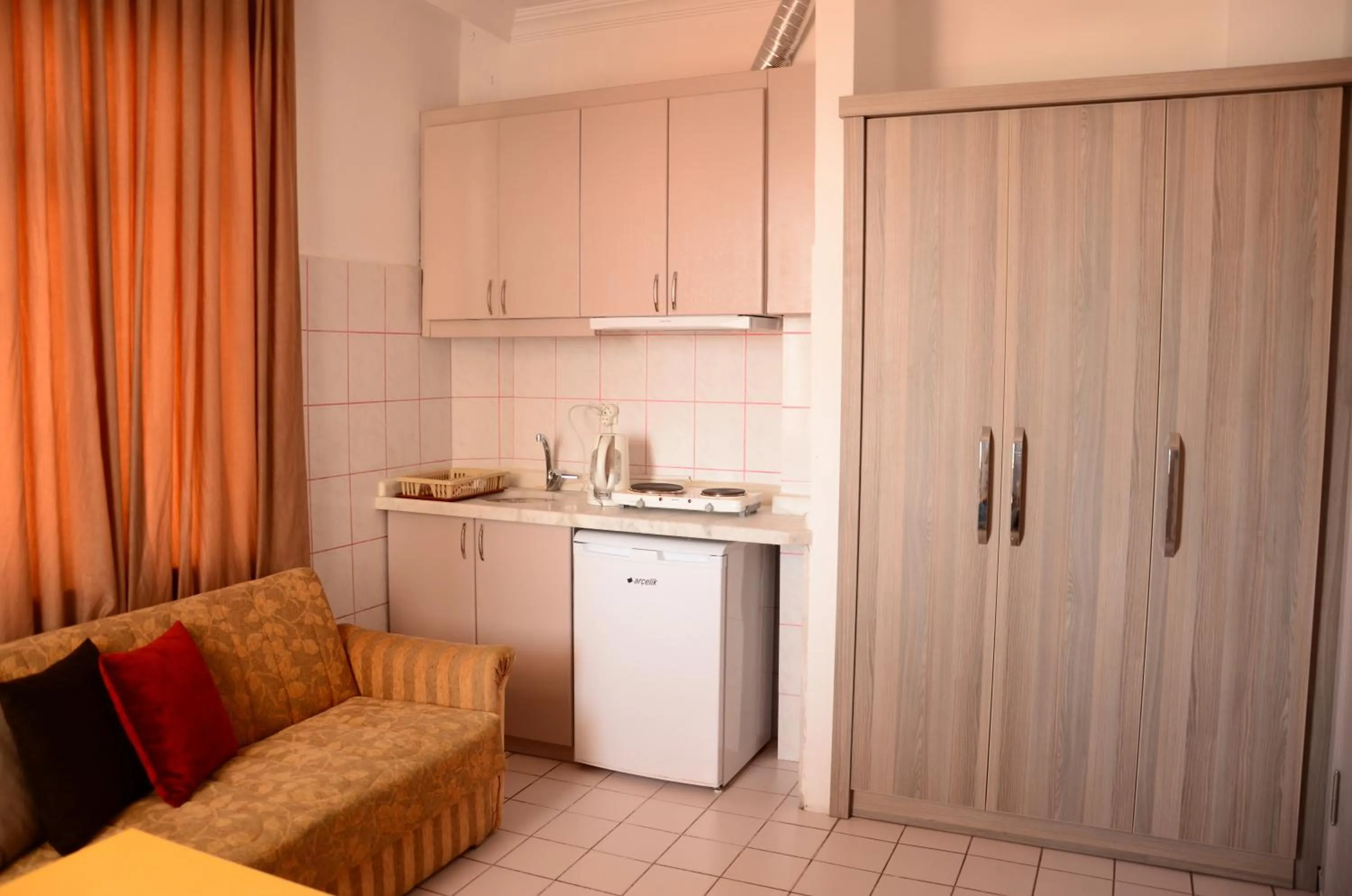 Kitchen or kitchenette in Sun Flower Apart Hotel