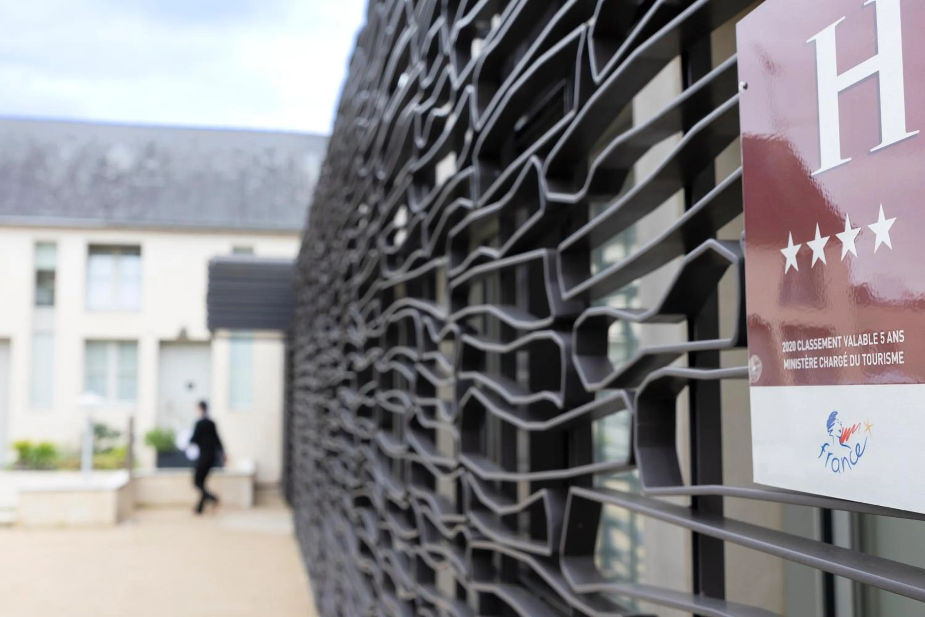 Property building in Hôtel Ginkgo - SPA Biloba