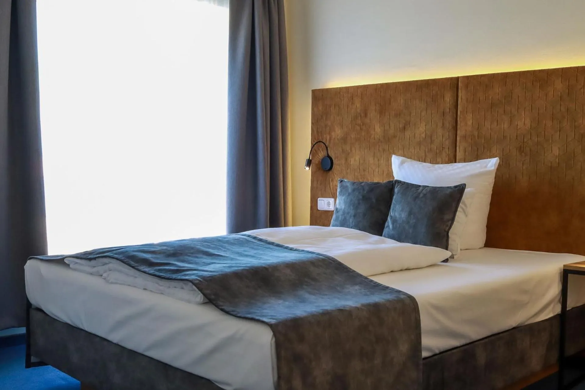 Bed in Project JUNE - ehemals Landgasthof Jüterbog