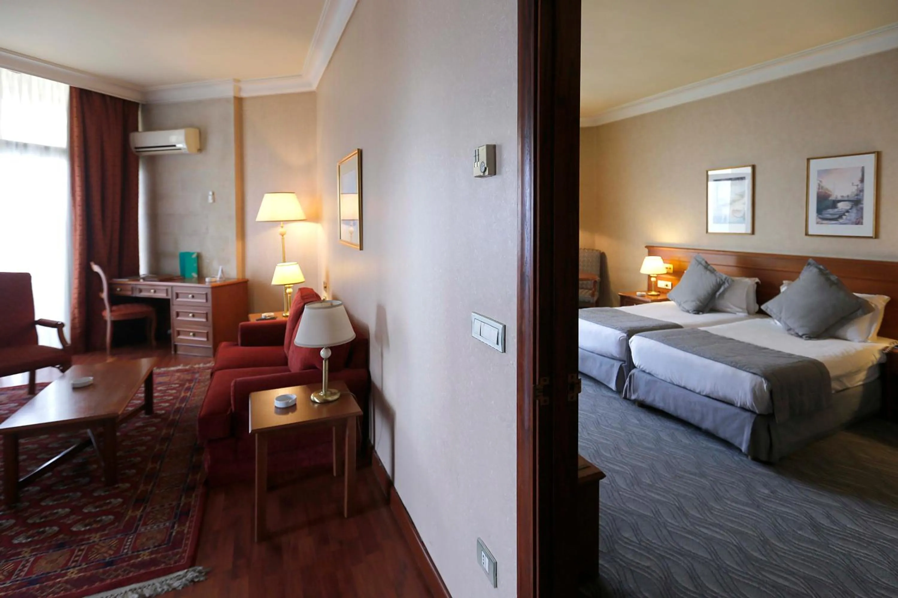 Living room, Bed in Bayview Hotel Beirut