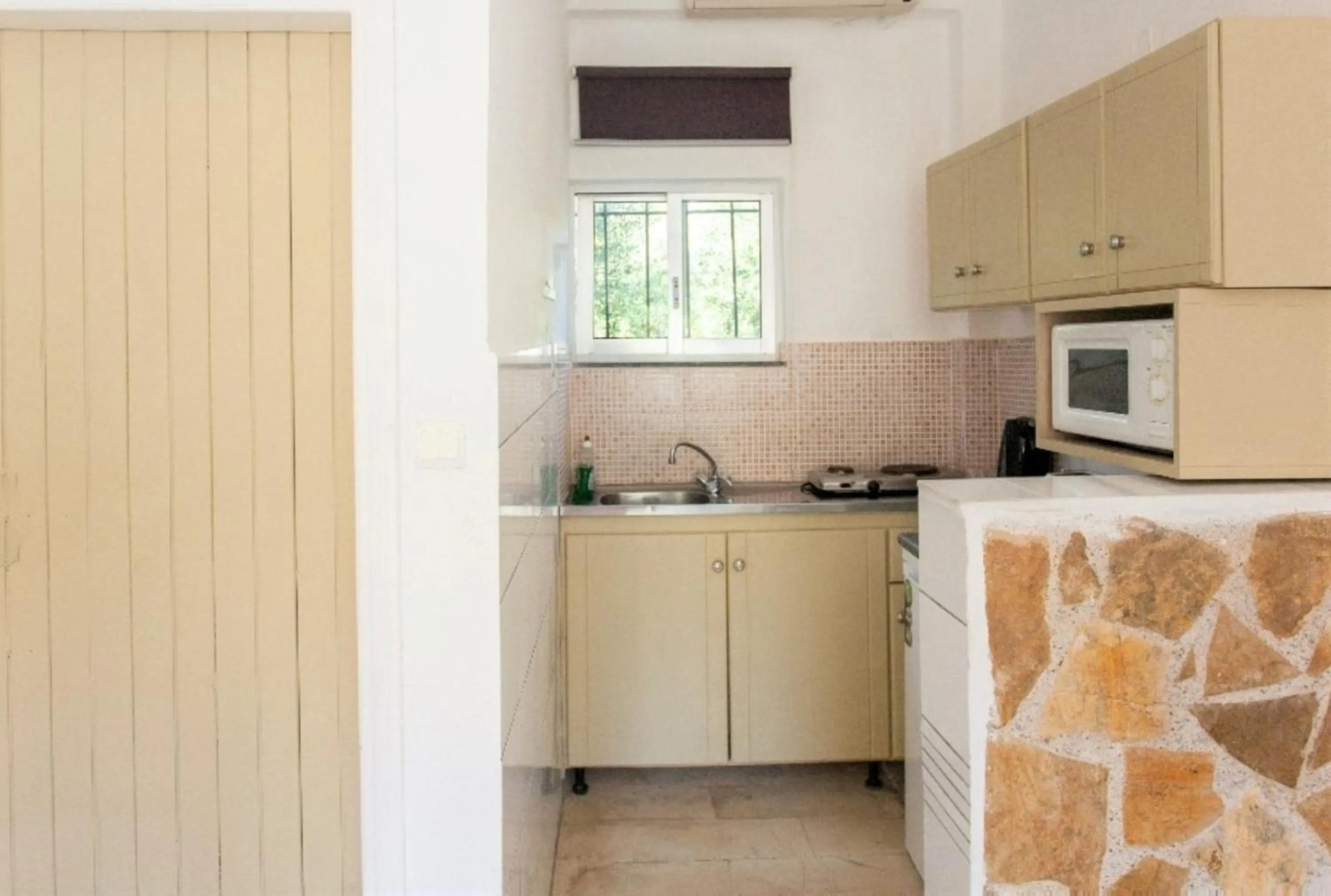 Kitchen or kitchenette in Stavros Villas&Apartments