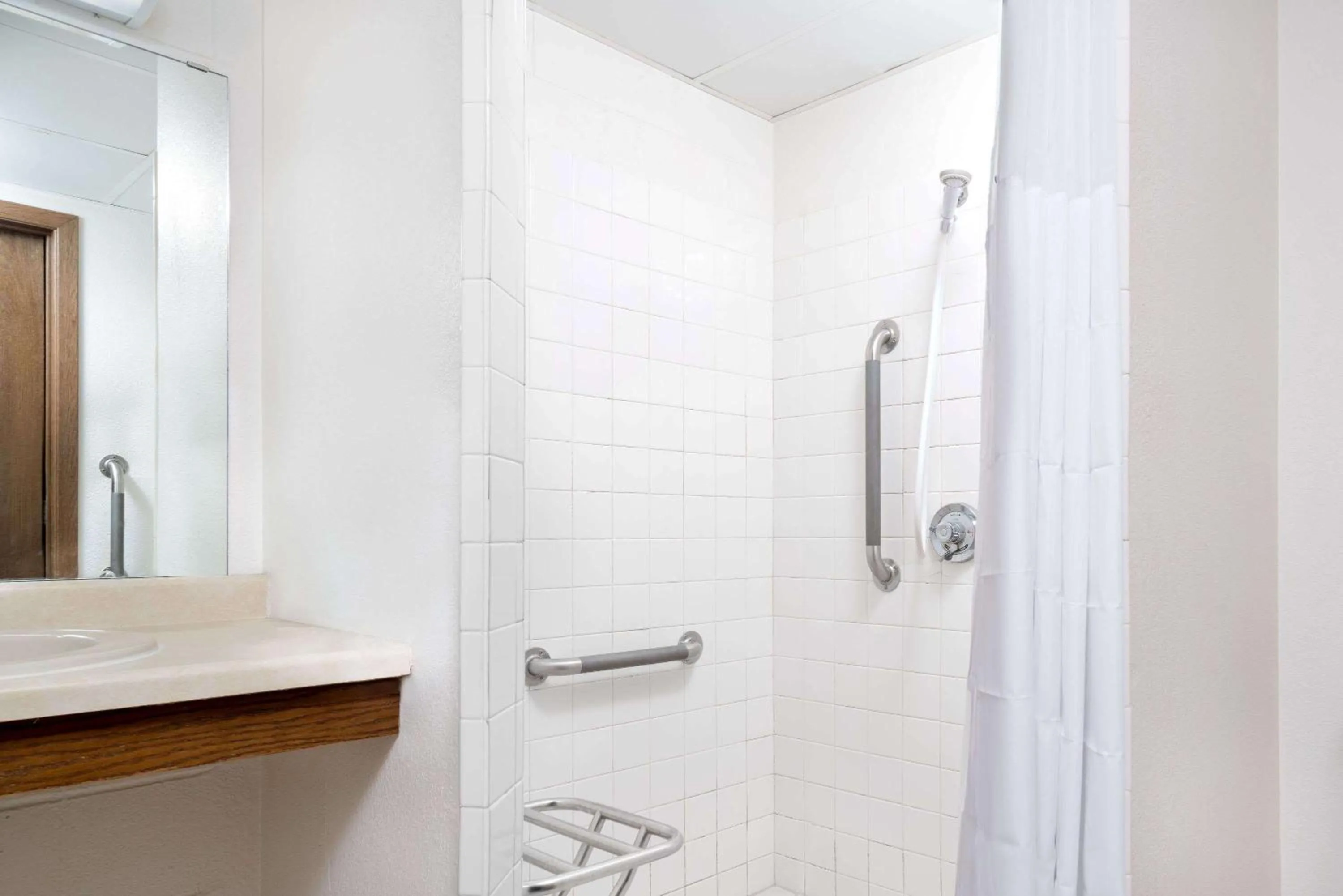 Bathroom in Days Inn by Wyndham St Cloud