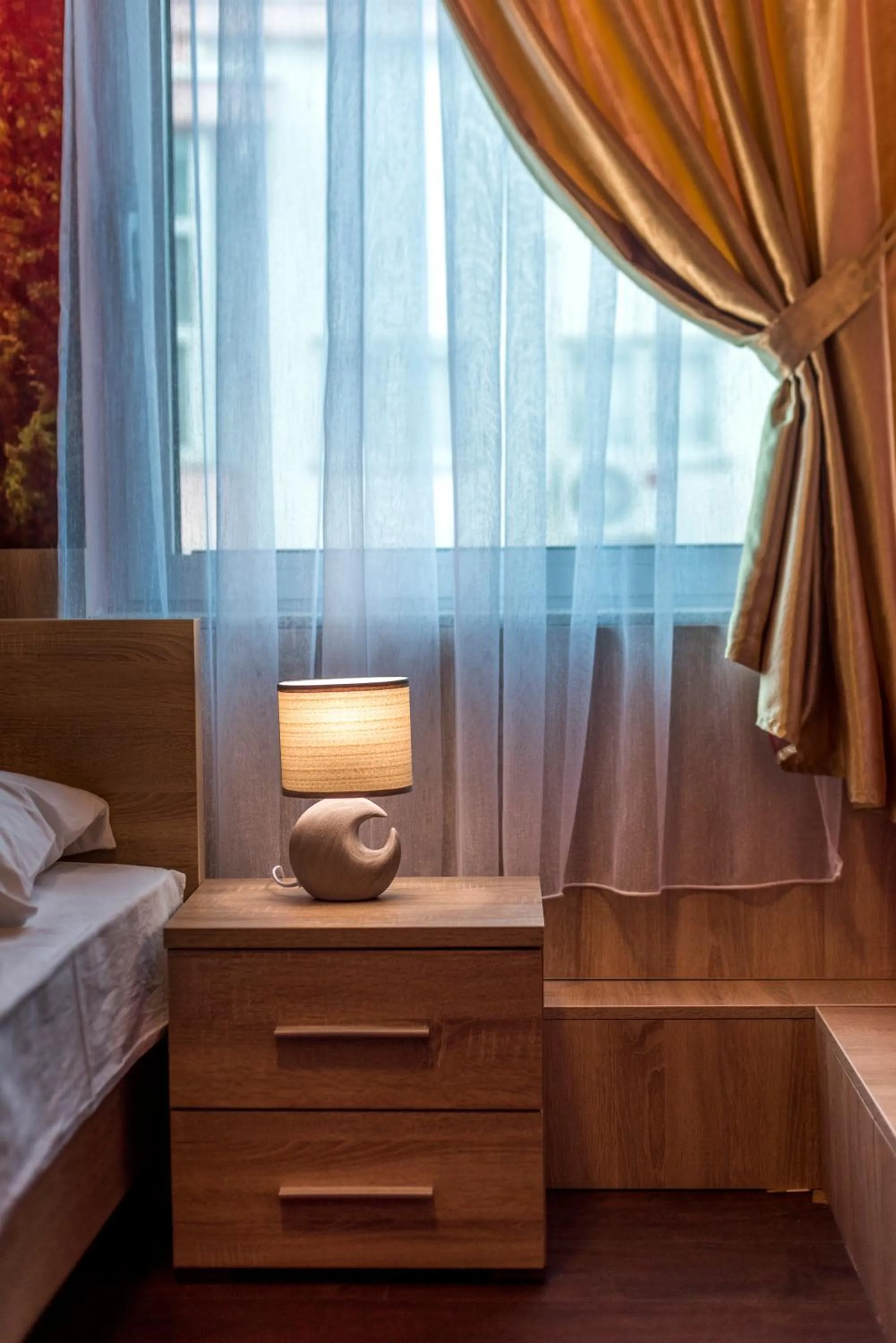 Living room, Bed in Hotel Oasis