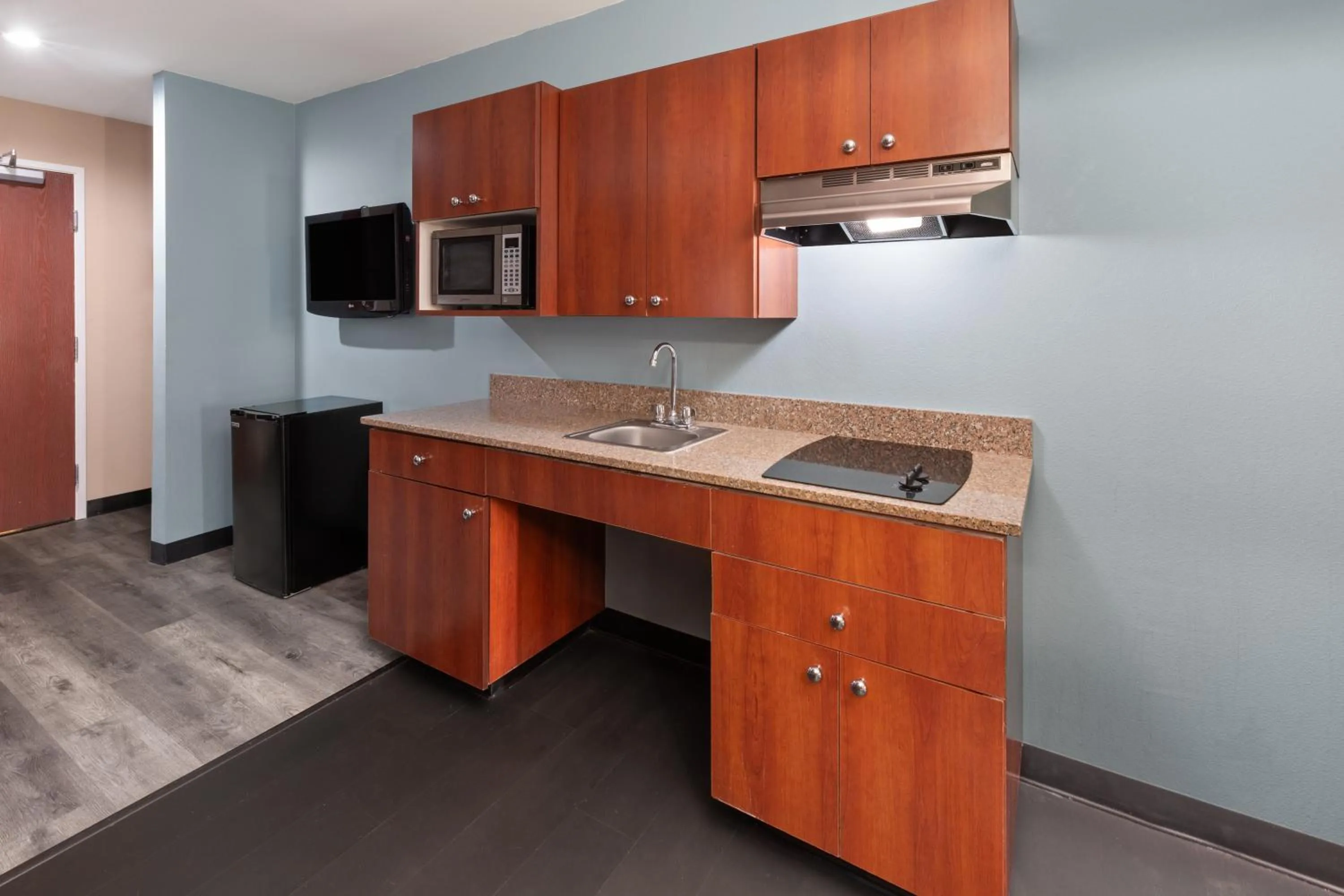 Kitchen or kitchenette in Super 8 by Wyndham Lubbock West