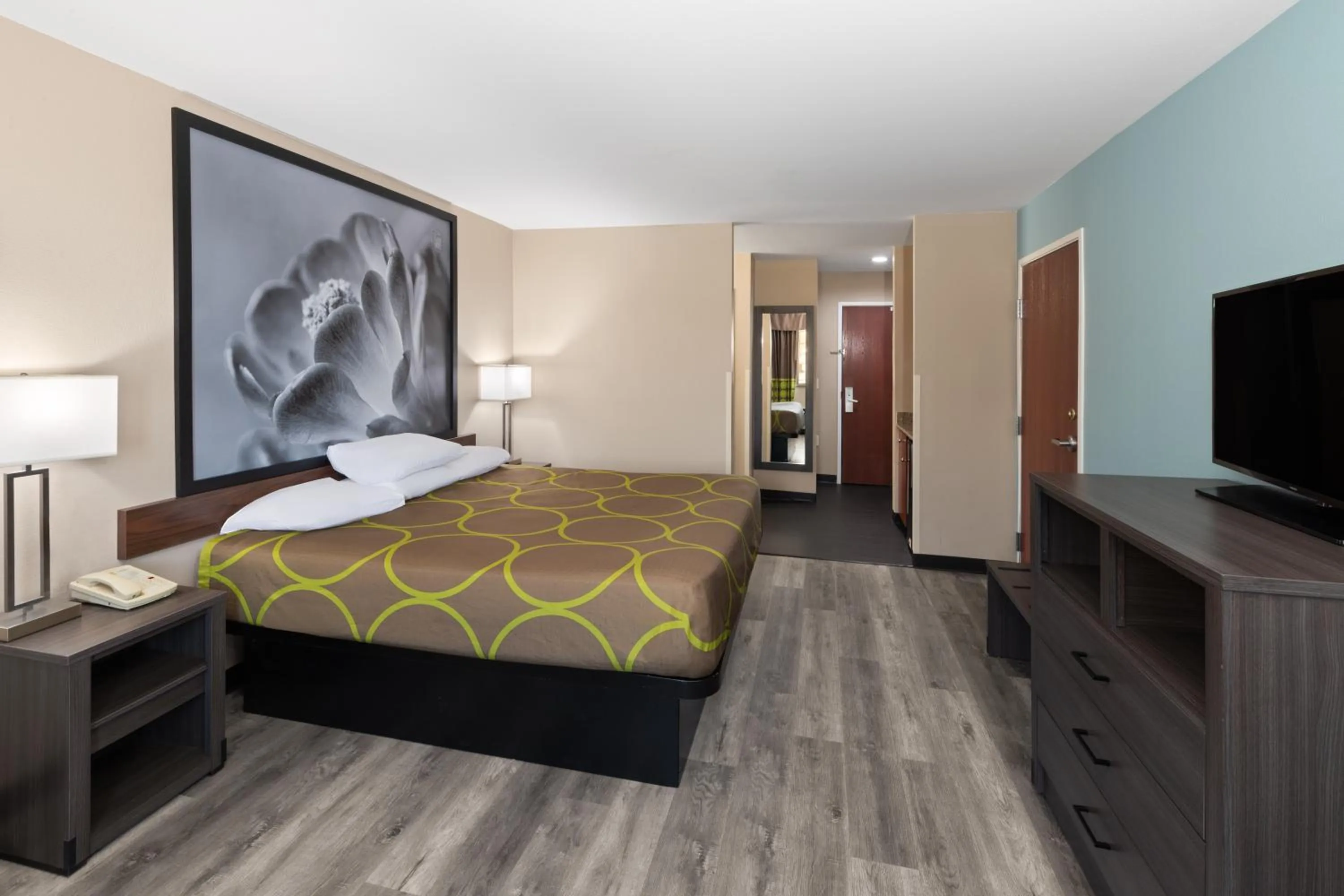 Bed in Super 8 by Wyndham Lubbock West