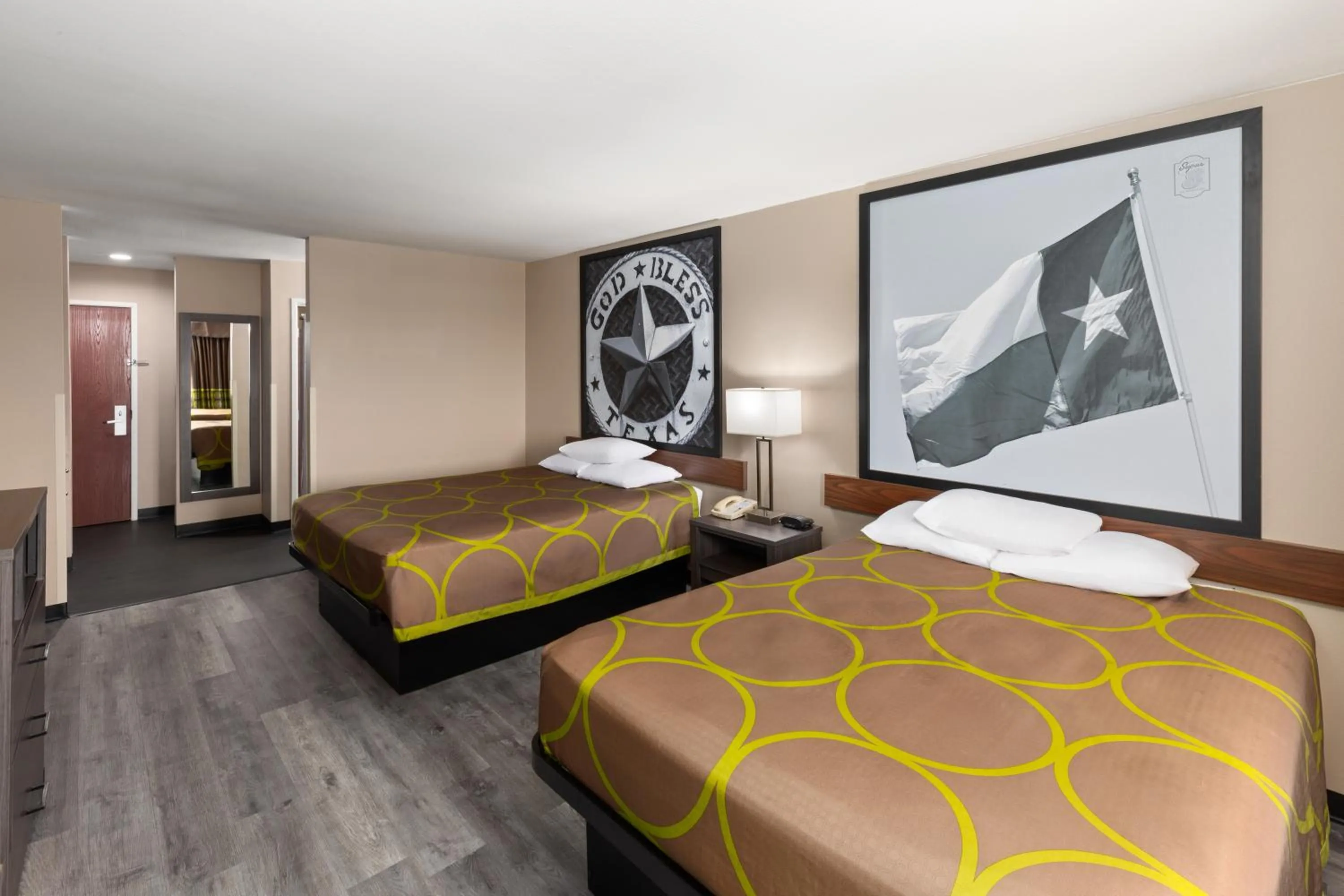 Bed in Super 8 by Wyndham Lubbock West